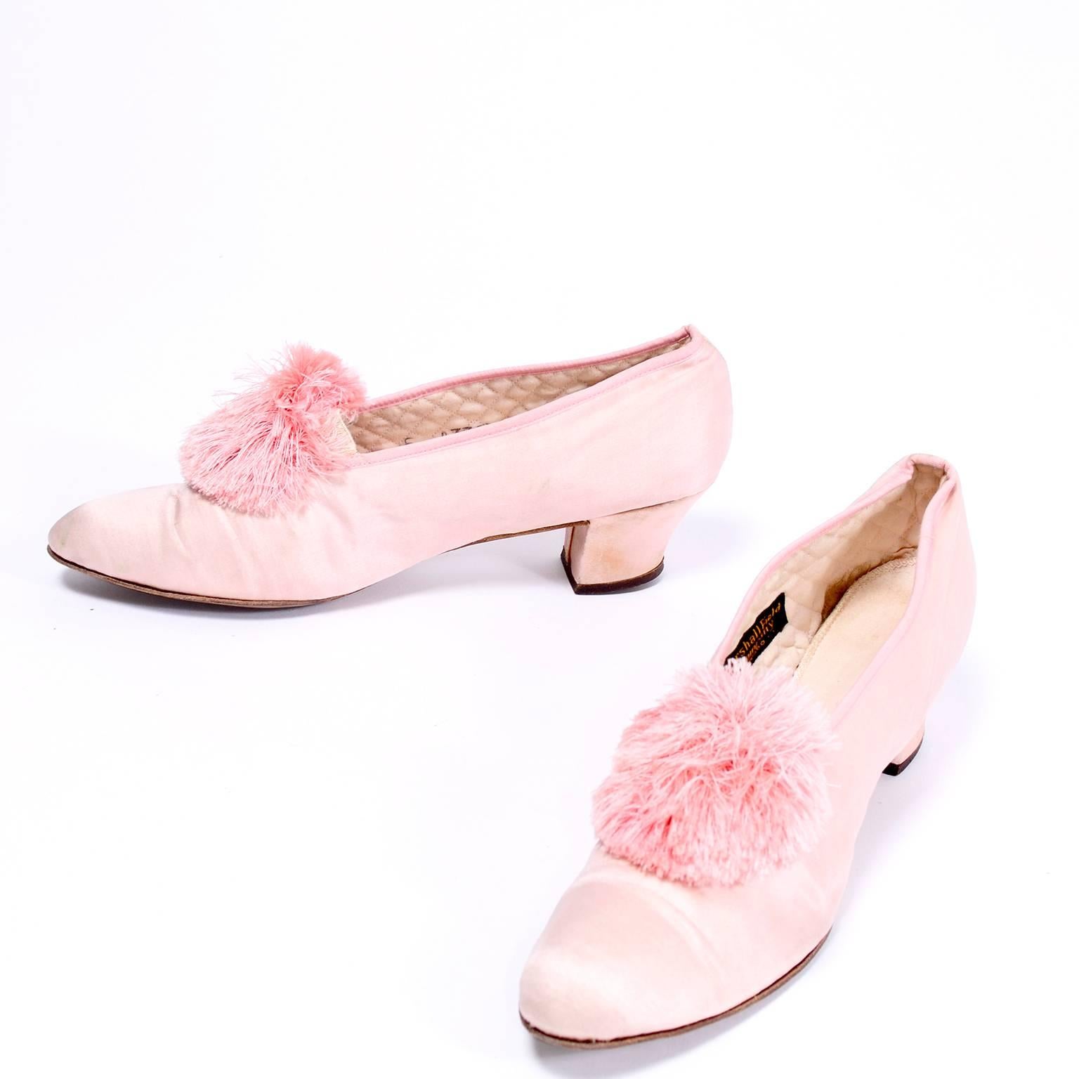 These beautiful pink satin shoes are from the late teens and we acquired them from an estate we purchased that included many high end articles of clothing and shoes from the 1910's through the 1960's.  This woman was a socialite who wore incredible