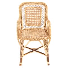Sillón de ratán Marshan en marrón By Creel and Gow