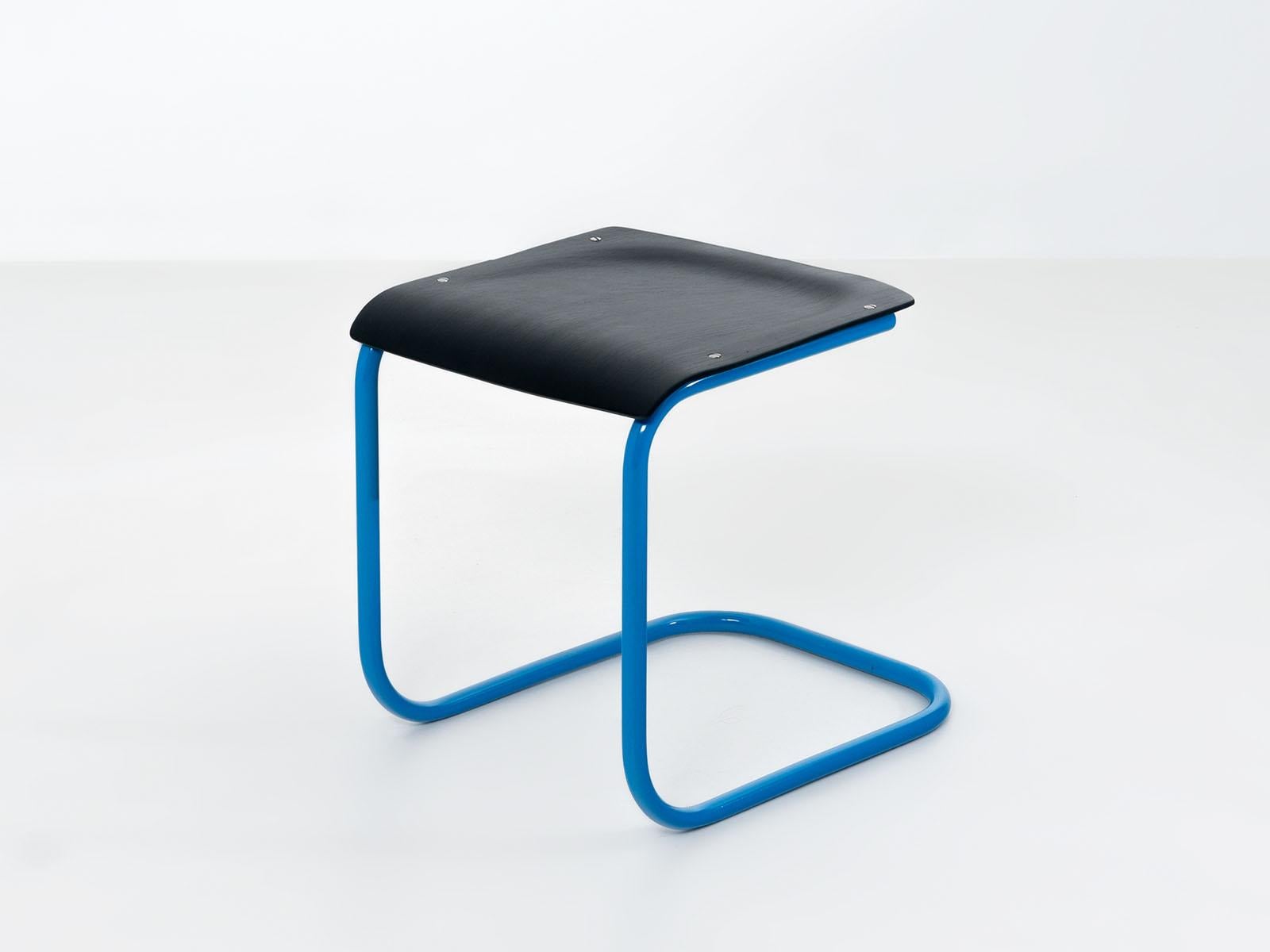 Mart Stam stool in black and blue, refurbushed and redesigned, Czechoslovakia, 1930s. 
Bent, powder coated steel and plywood in mat varnish.
 