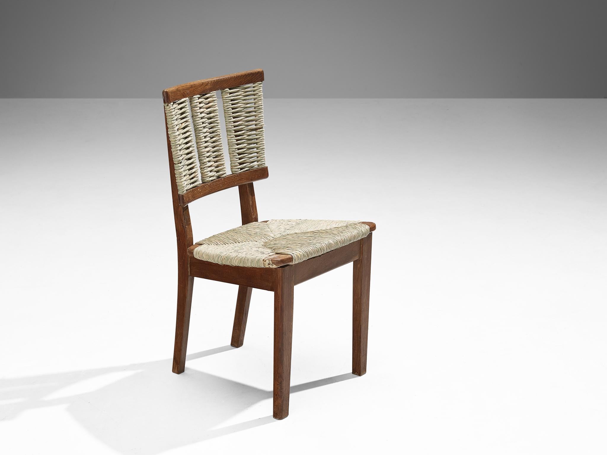 Mart Stam, dining chair, model 'A2-1', oak, seagrass, The Netherlands, 1947.

Executed in 1947, this dining chair by Dutch modernist designer and architect Mart Stam (1899-1986) boasts a rustic character. This is achieved by the specific use of