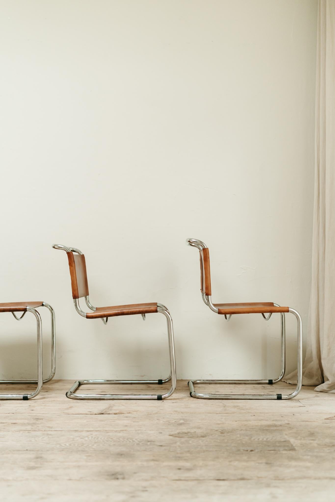 love the patina on this set of 4 cantilever leather and chrome Mart Stam chairs ... in very good vintage condition ...