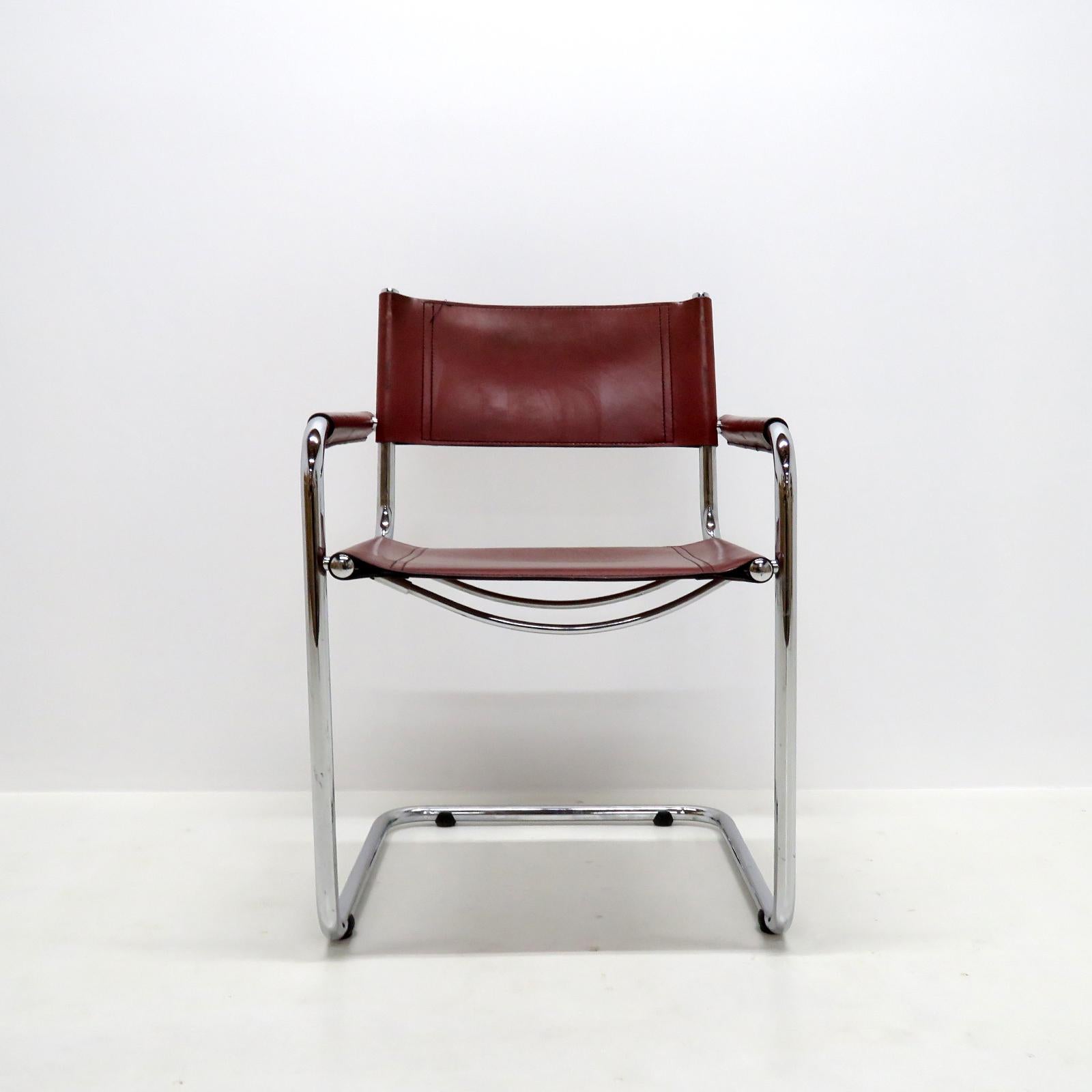 Wonderful dining chairs Model S33 by Mart Stam for Fasem International, Italy, 1981, with ox blood red leather on tubular chrome plated steel frames, nice patina and very comfortable. Priced individually.