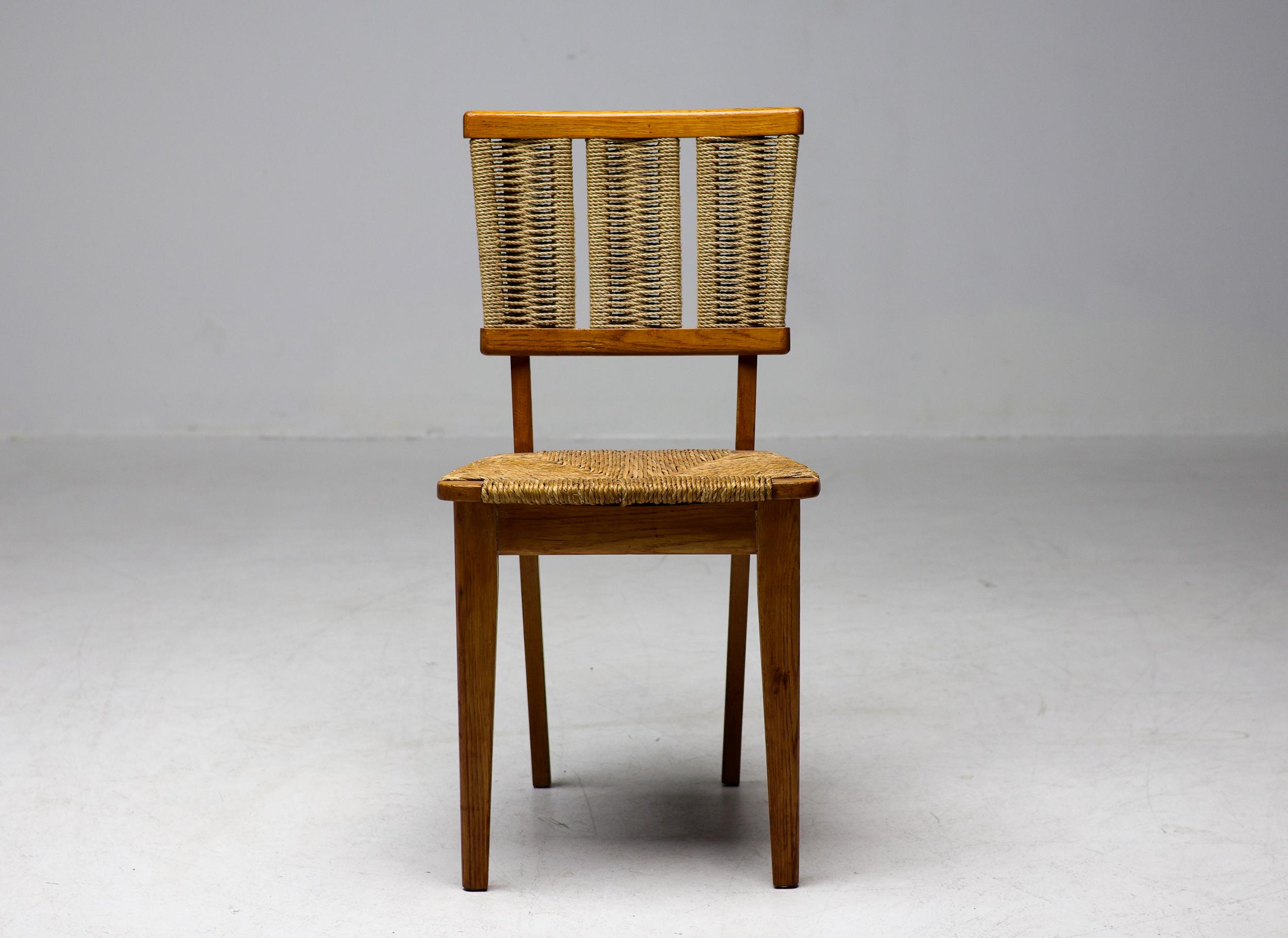 Mart Stam model 'A2-1', oak, rush and rope, The Netherlands, 1948.  
Executed in 1948, this dining chair by Dutch modernist designer and architect Mart Stam (1899-1986) boasts a rustic character. This is achieved by the specific use of materials in