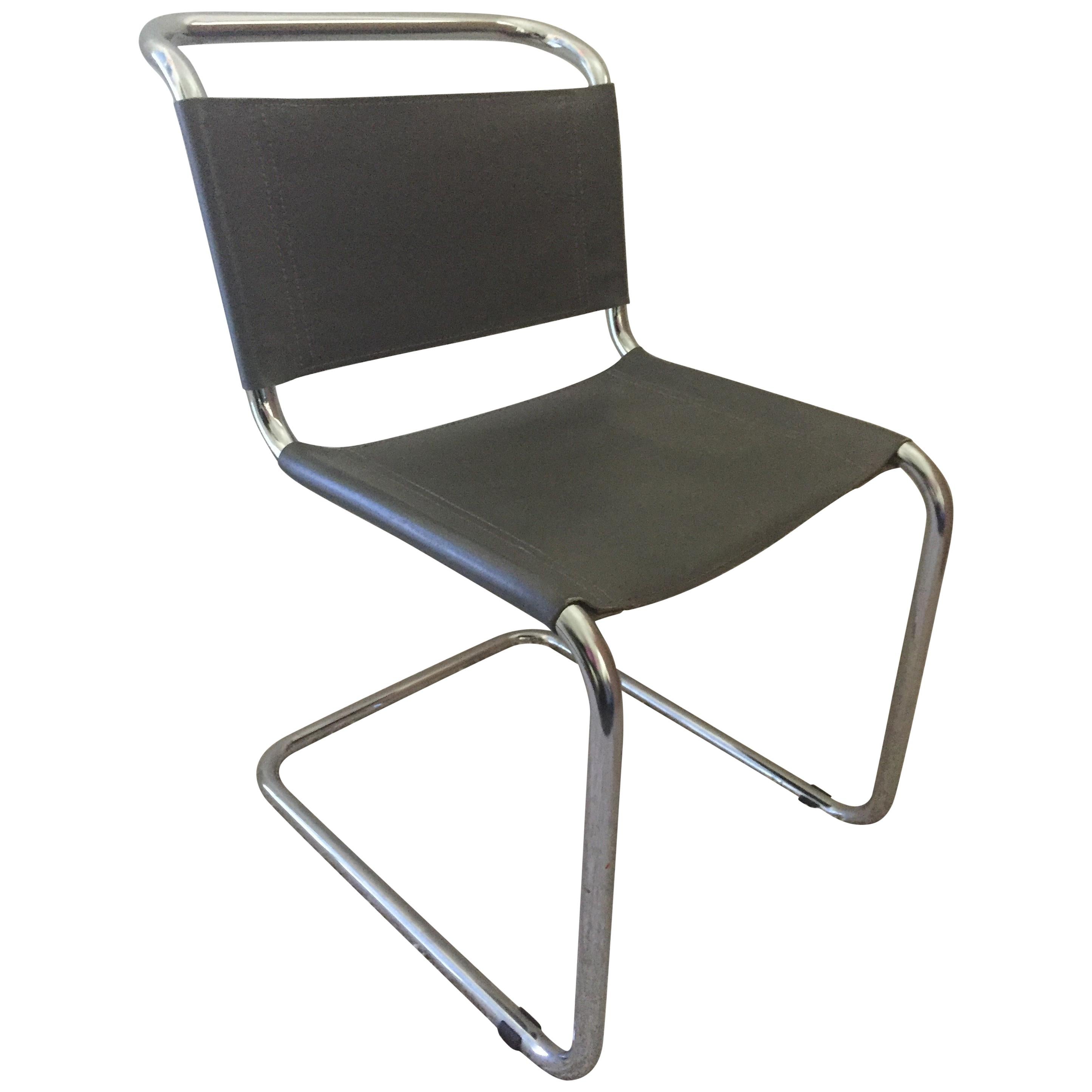 Pair of Mart Stam tubular chrome cantilevered chairs, with medium to light grey leather original seats and back, these chairs are similar to the design of Marcel Breuer chairs.