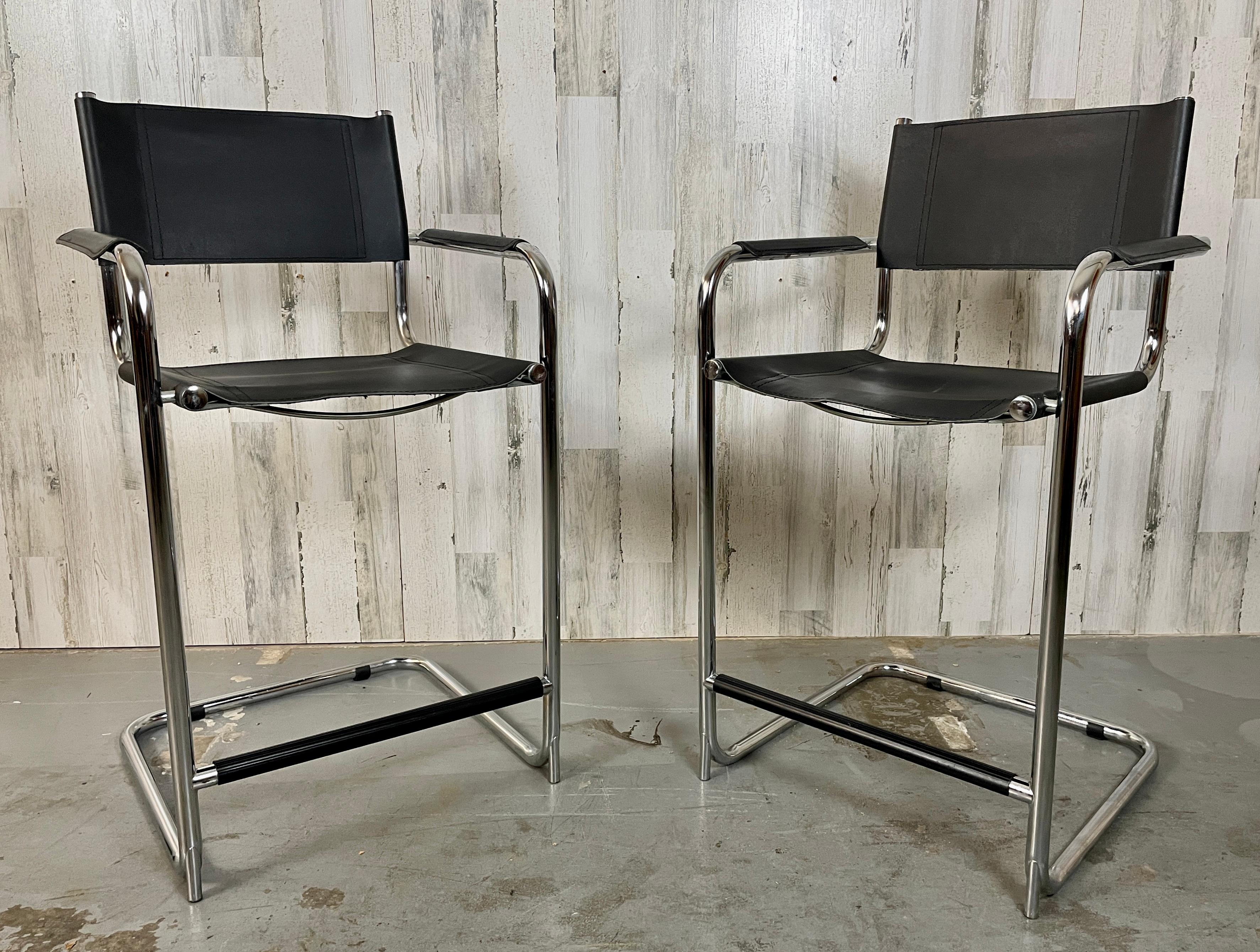Mart stam style Italian cantilever chrome and leather barstools.