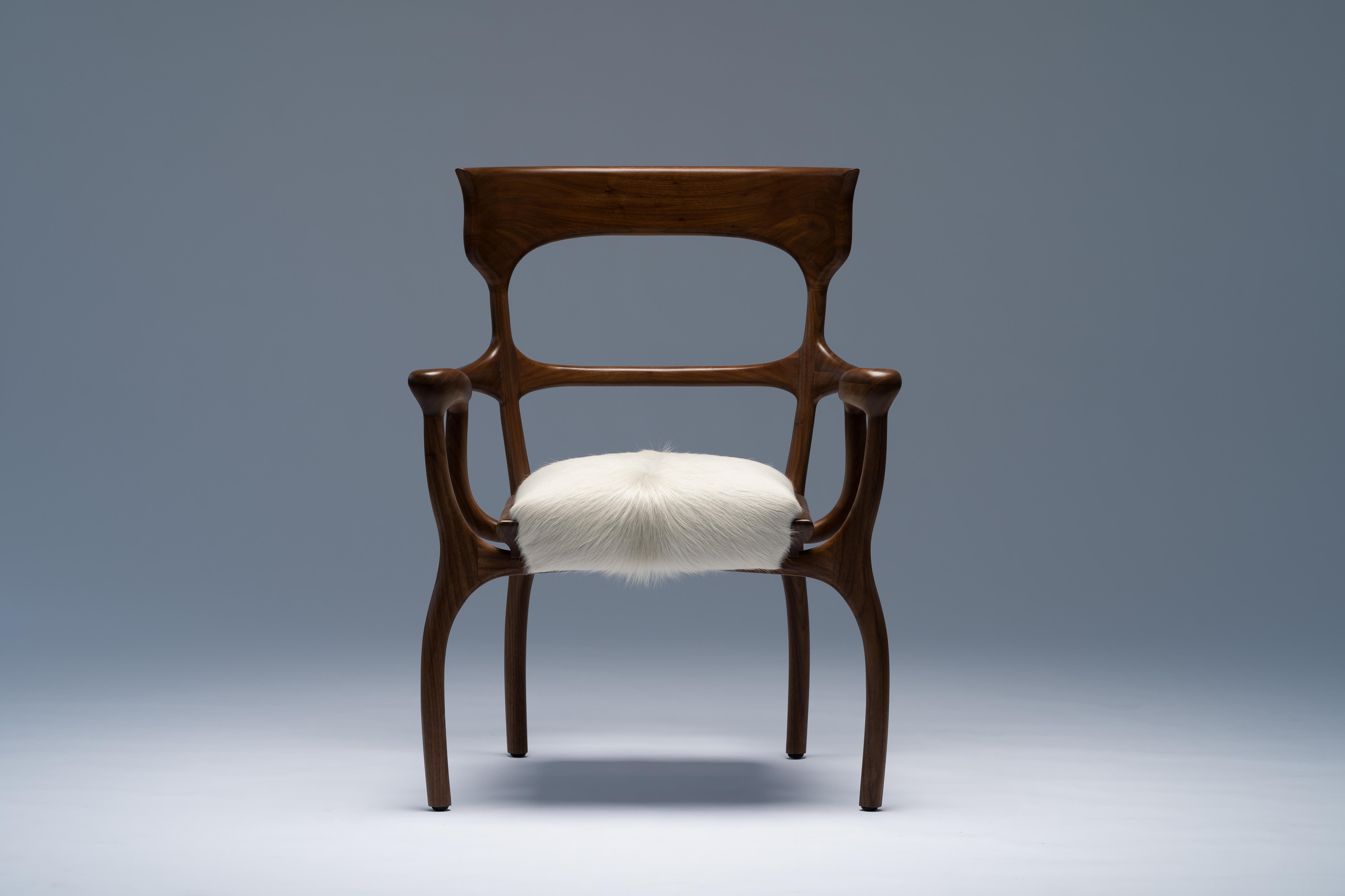 MARTA chair by Mandy Graham 

MARTA
M01, chair armchair
American walnut or sandblasted white oak, hairy cowhide seat
Measures: 27