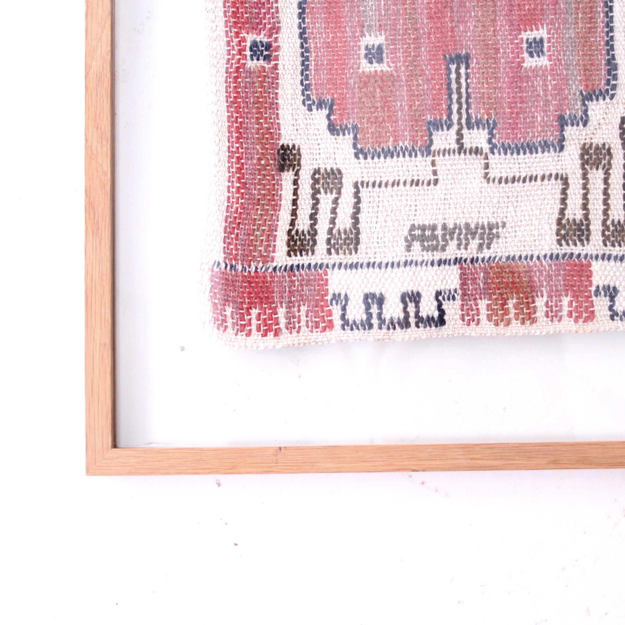 A beautiful handwoven textile in tapestry technique by Marta Maas-Fjetterström.

Framed in oak and double glass (sandwich) so that the wall color shows next to the tapestry.

Signed AB MMF. (AB Ma¨rta Ma°a°s-Fjetterstro¨m).

Designed in 1928,