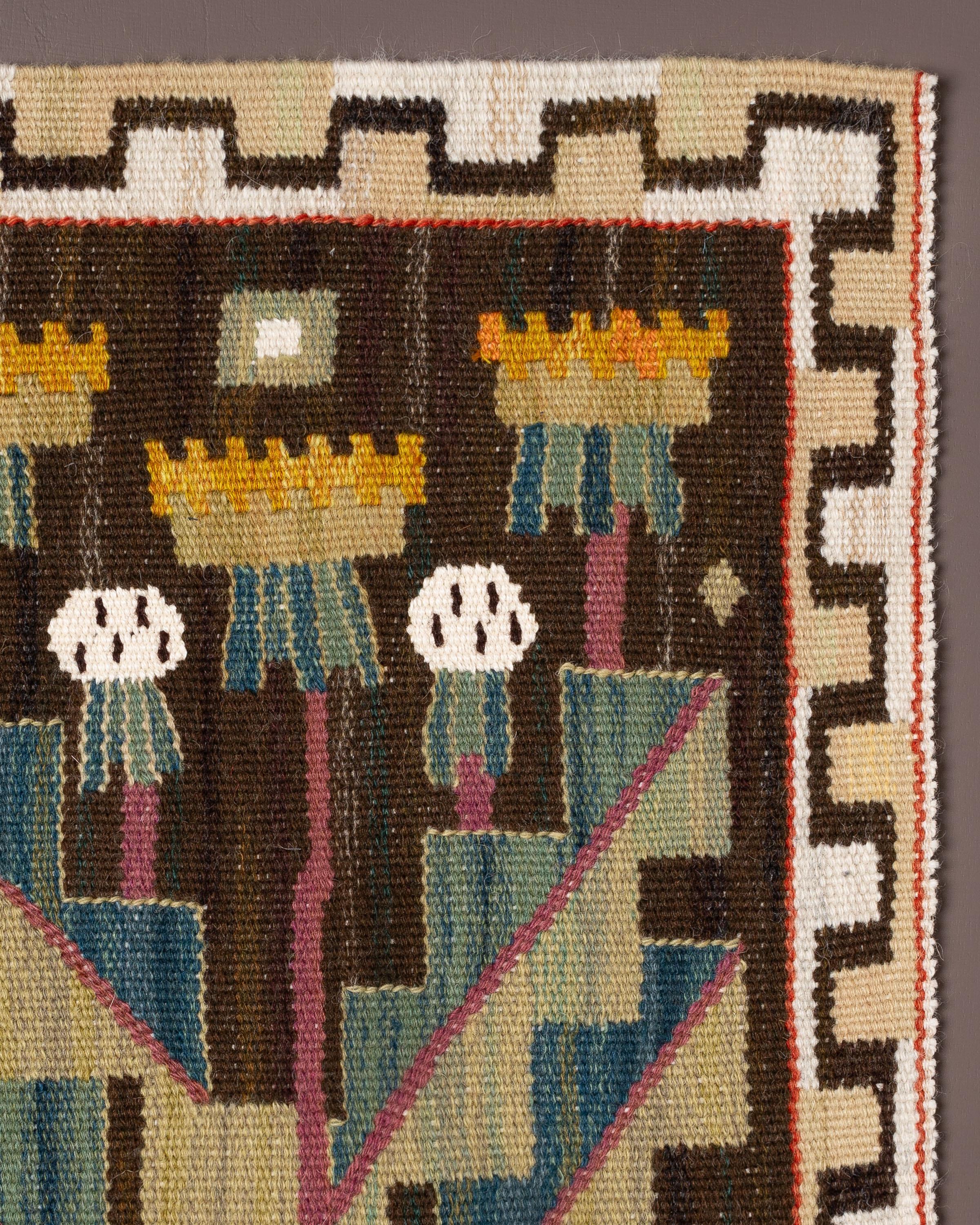 Handwoven tapestry with a dandelion flowers designed by Märta Måås-Fjetterström in 1928.

One of all the flowers in the larger wall tapestry Juniblommor by Märta Måås-Fjettesrtröm 1928.

Woven in wool on a wool warp by artisan weaver Margareta