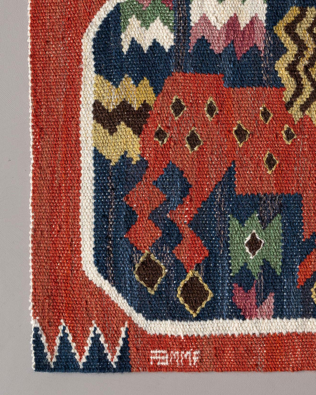 Handwoven tapestry in wool with motif of a red horse, designed by Märta Måås-Fjetterström in 1930. 

Several horses with different poses appears in the collection of red horses by MMF. They are details from the large wall tapestry Röda Hästarna,