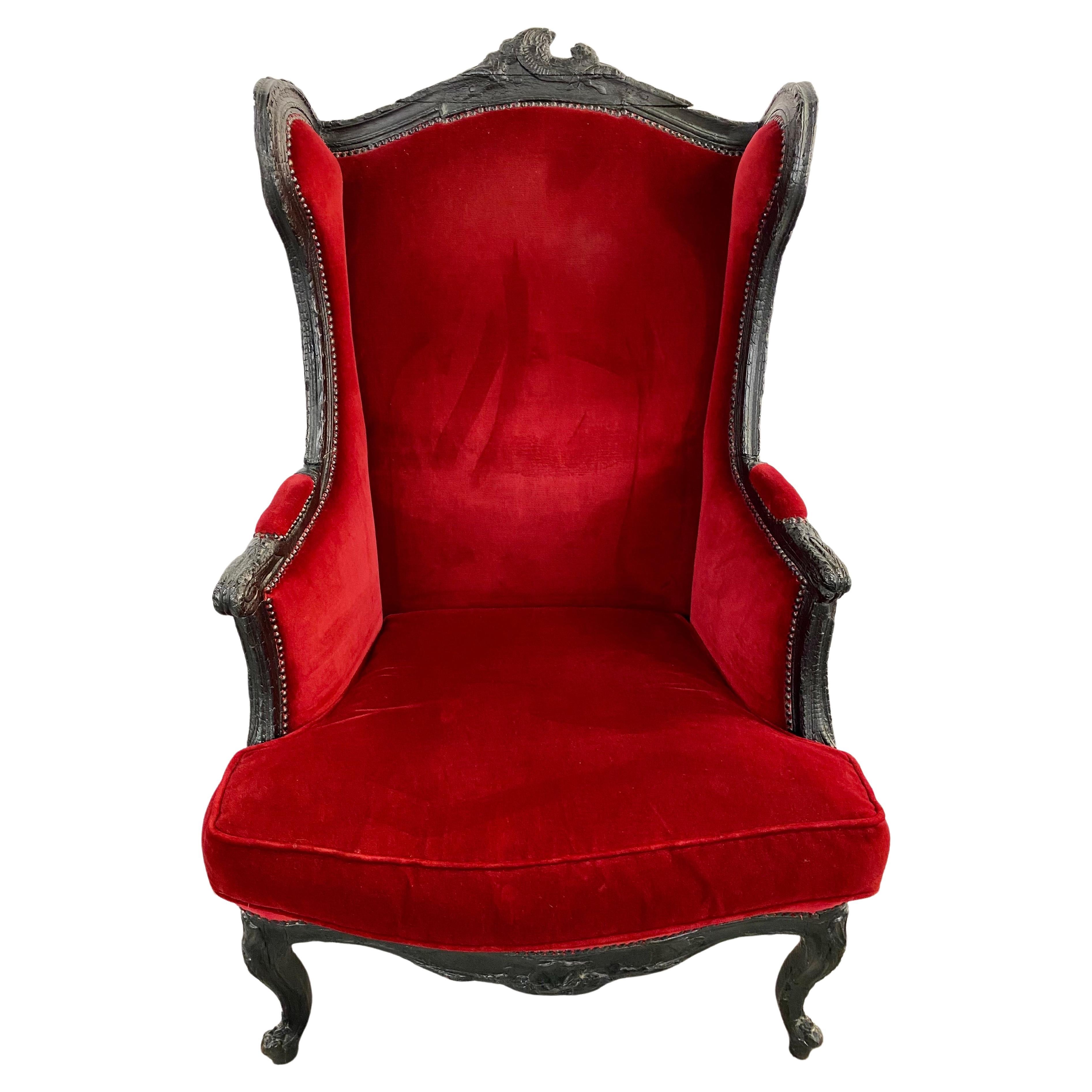 A glamorous and hight quality Renaissance Revival wingback chair and matching ottoman designed by award winning Dutch artist designer Marteen Baas ( born in Germany, 1978). This exquisite set of chair and ottoman has been specially designed for the