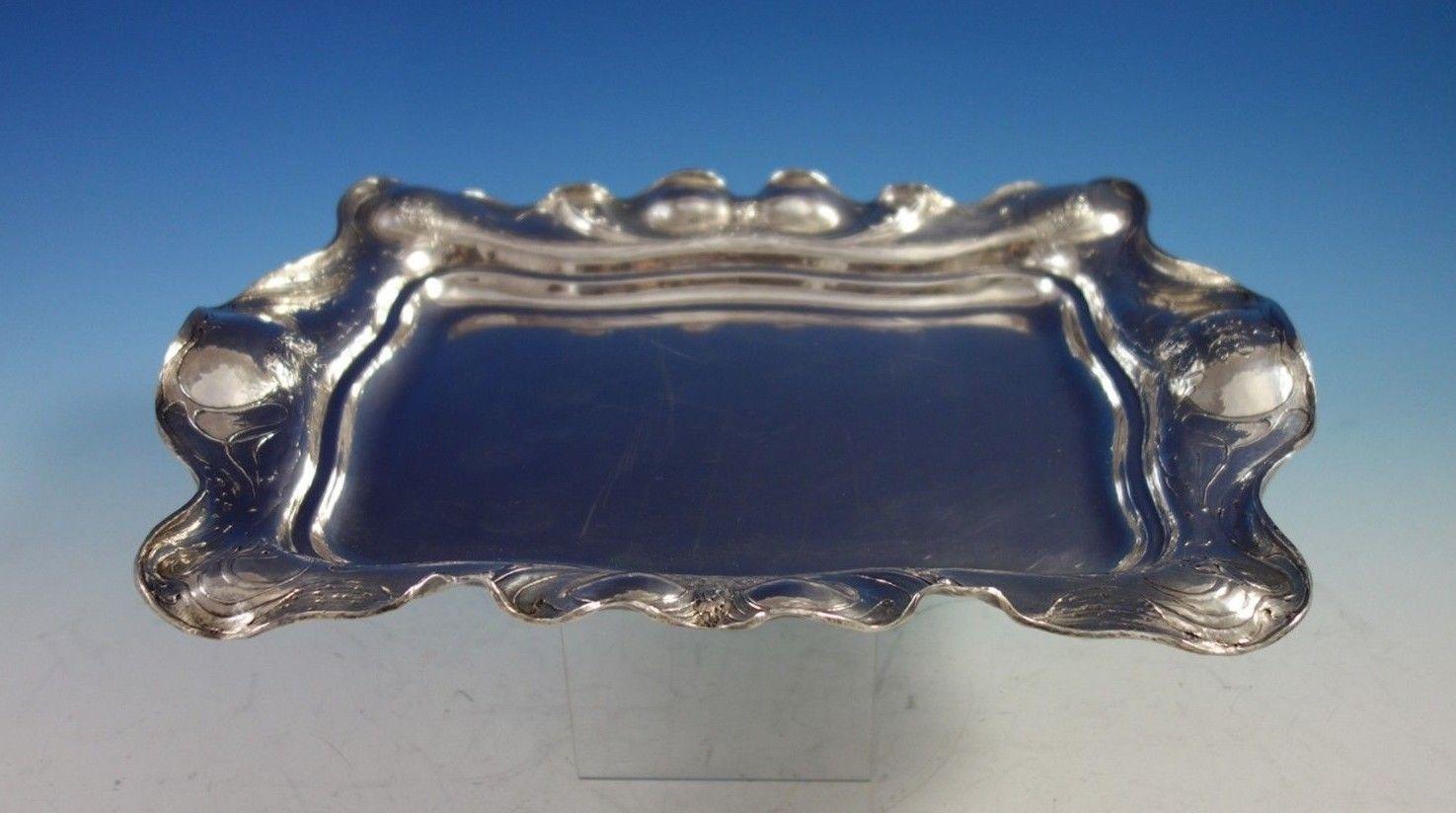 Martele by Gorham
Exceedingly Rare Martele by Gorham sterling silver asparagus tray with chased asparagus design. There were only eight Martele asparagus trays made. This one was made August 28, 1899.
This tray is marked #2224, measures 14 1/2 x 10