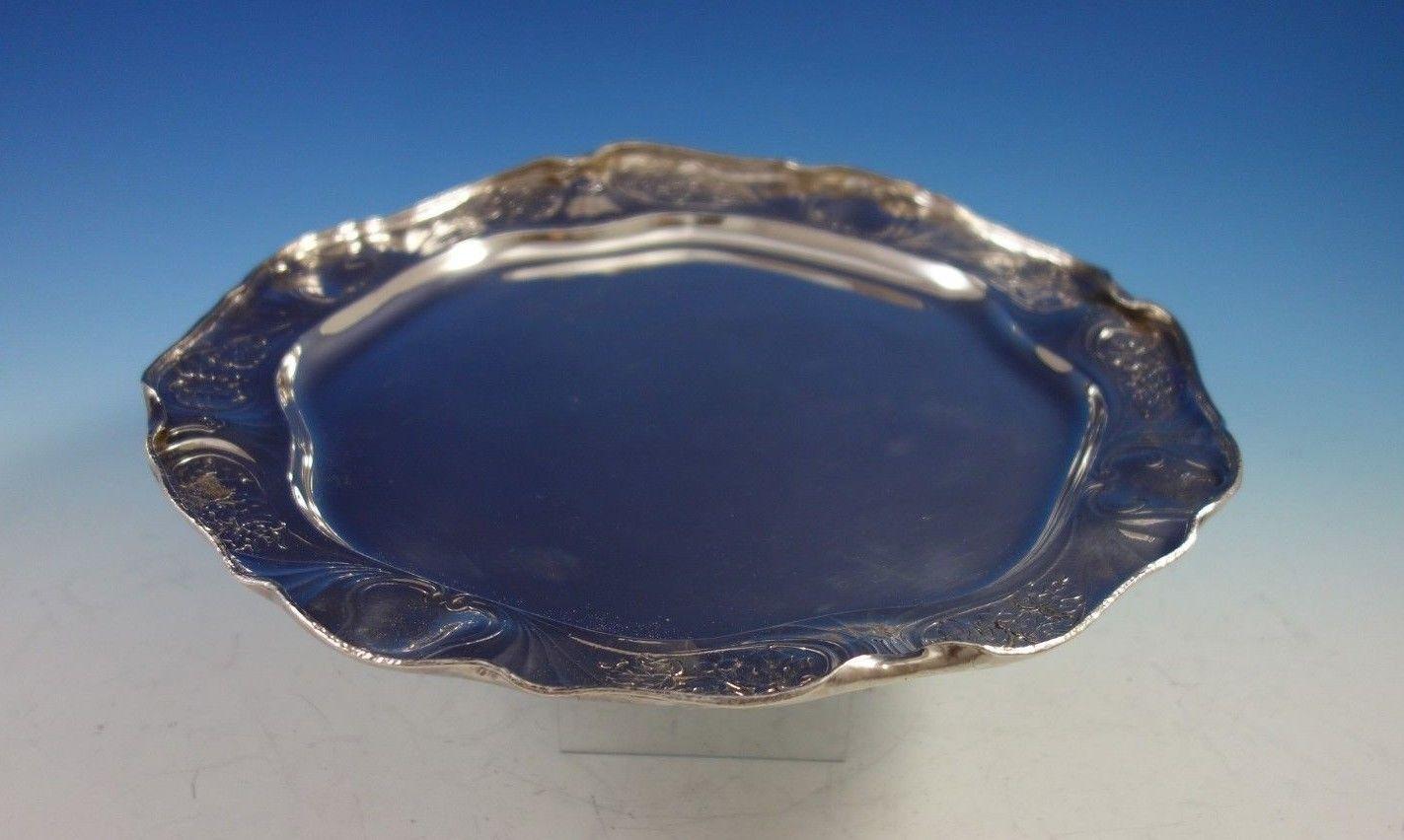 Stunning Martele by Gorham sterling silver entree serving tray / dish with chased fruit and leaves. This piece was made by James G. Seton on August 28, 1899, taking 20 hours to chase and 50 hours to make.
This tray / dish is marked #9010, measures