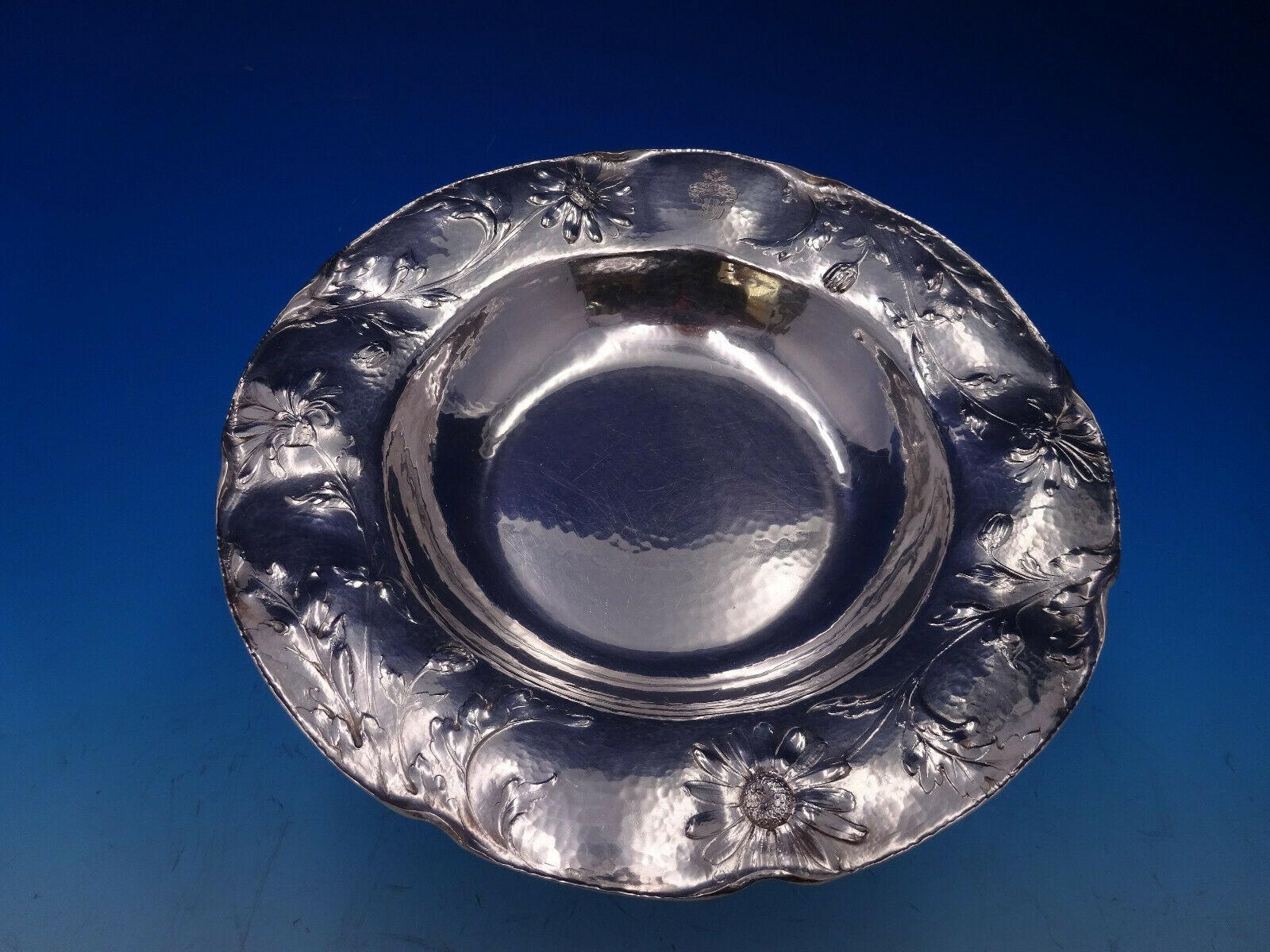 Martele by Gorham

Superb exceedingly rare set of 12 Martele’ by Gorham .9584 sterling silver Soup Bowls with daisy motif, made July 1907, making time 6 hours, chasing time 25 hours by Emil Stursberg. Gorgeous hand chased daisy decoration and hand
