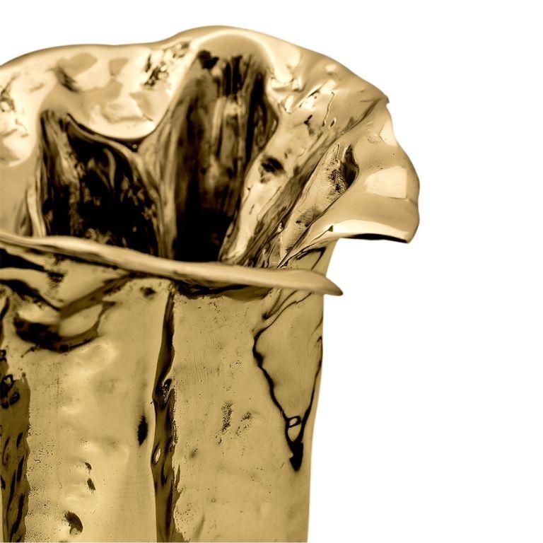 Martellato is a sculptural vase defined by its refined craftsmanship and striking texture. Entirely handmade, each piece bears subtle variations that highlight the uniqueness of artisanal work. Its hammered surface, created through a slow and