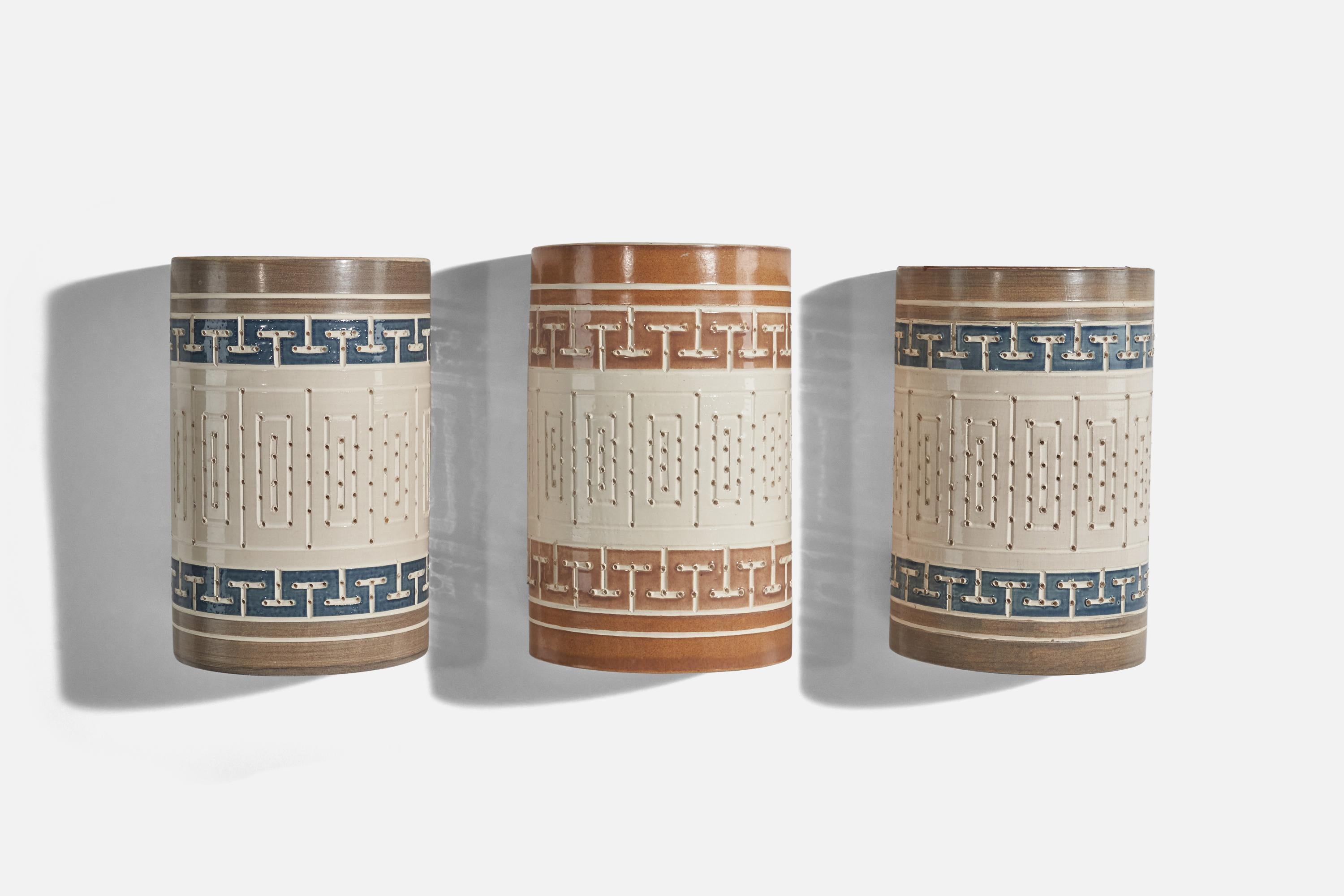 A set of 3 ceramic sconces / wall lights designed by Martha and Beaumont Mood and produced by Beaumont Mood Lighting, San Antonio, Texas USA, 1970s. 

Socket takes standard E-26 medium base bulb.
There is no maximum wattage stated on the fixture.
