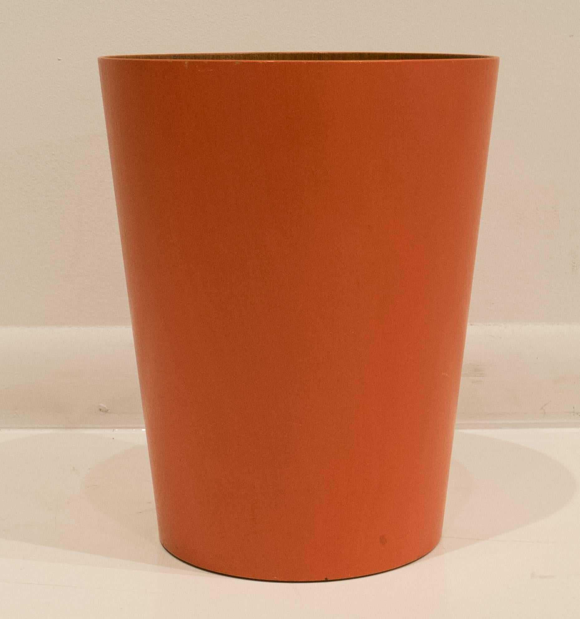 Wastebasket with teak interior and uncommon orange-lacquered beech exterior. Designed by Martin Aberg for Servex/International Designers Group, Sweden, circa 1960s.