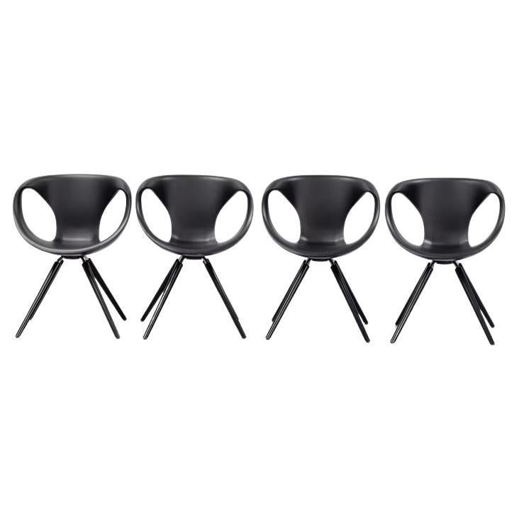 Martin Ballendat Set of Four Up Chairs for Tonon, Italy.
The Up-Chair is an extremely emotional product. Designed to give the feeling of a light seat, the “Up” owes its name to the wide and airy armrests. The best part is how comfortable these