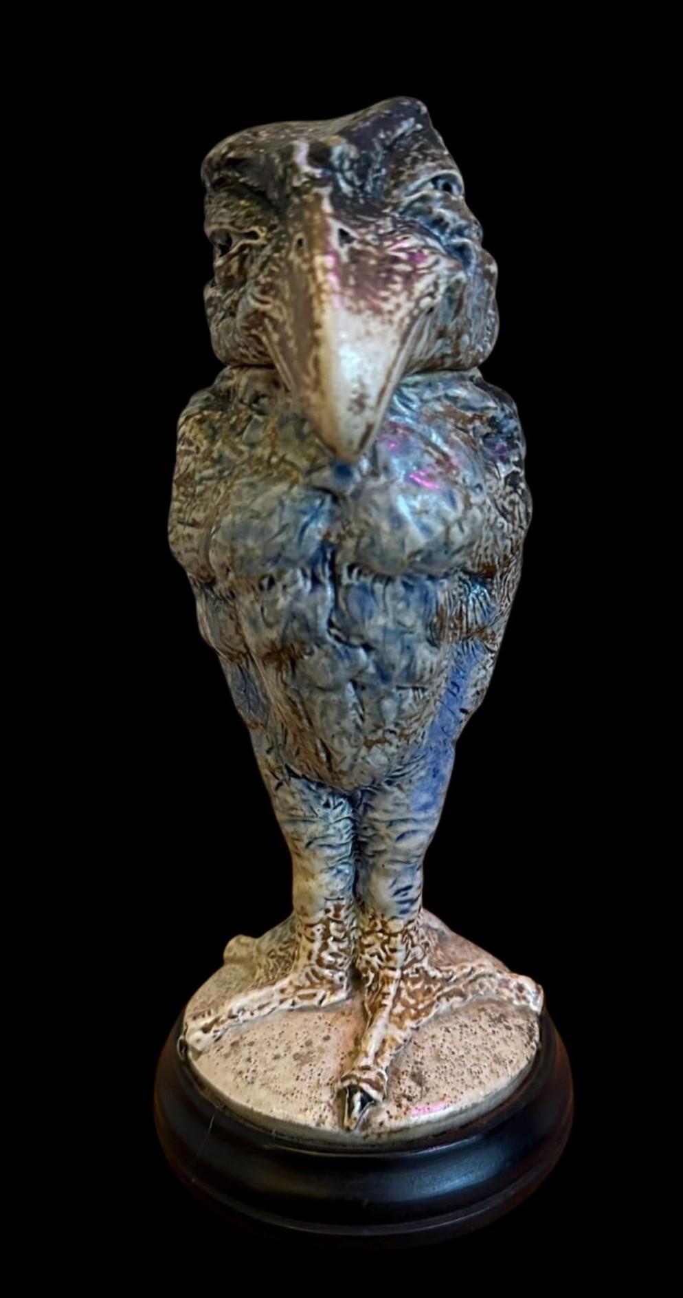 5322

Robert Wallace Martin

A Martin Brothers “Wally Bird”

With good modelling in blue, green and buff glazes with a sideways, glancing expression

Head and Body dated 1906

Invisible restoration.