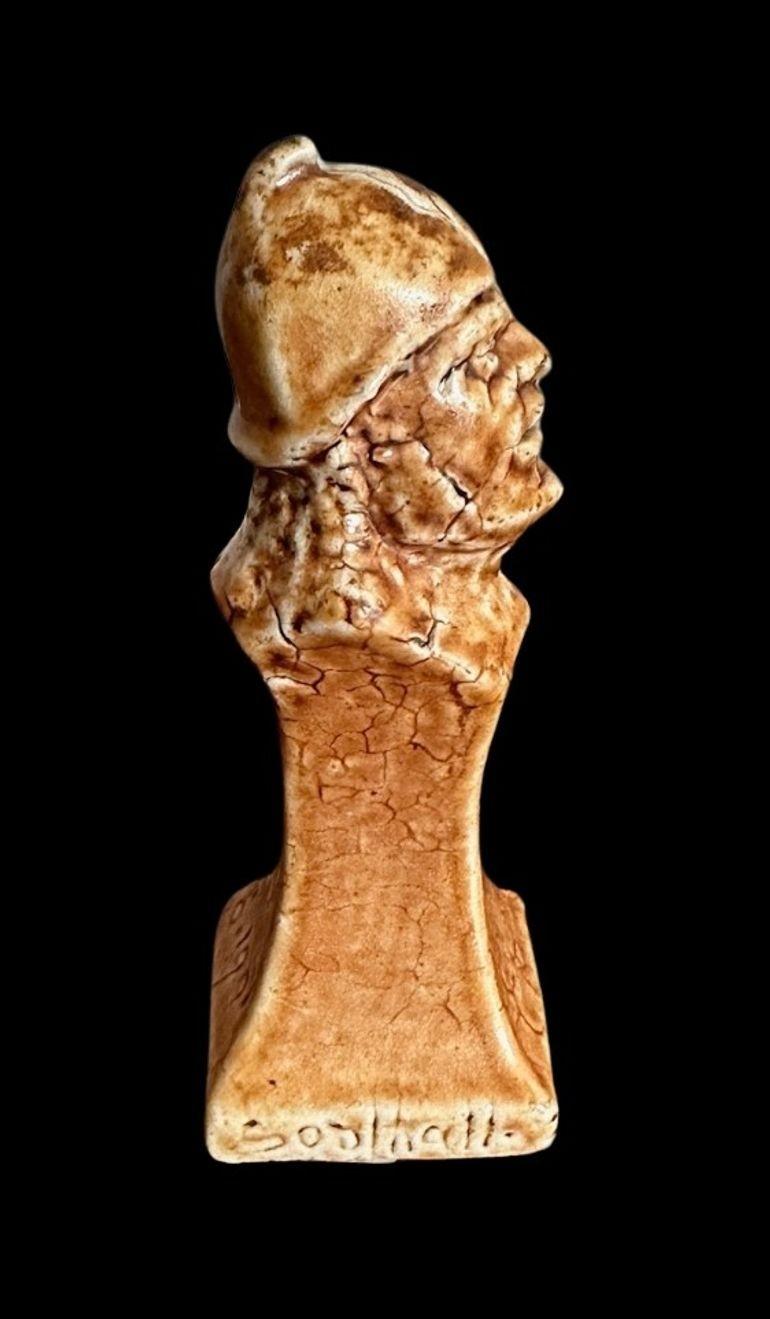 28
R W Martin for the Martin Brothers, a Chess Piece modelled as a Pawn
Numerous firing cracks
8.5cm high, 3 cm wide, 3cm deep
Dated 1901