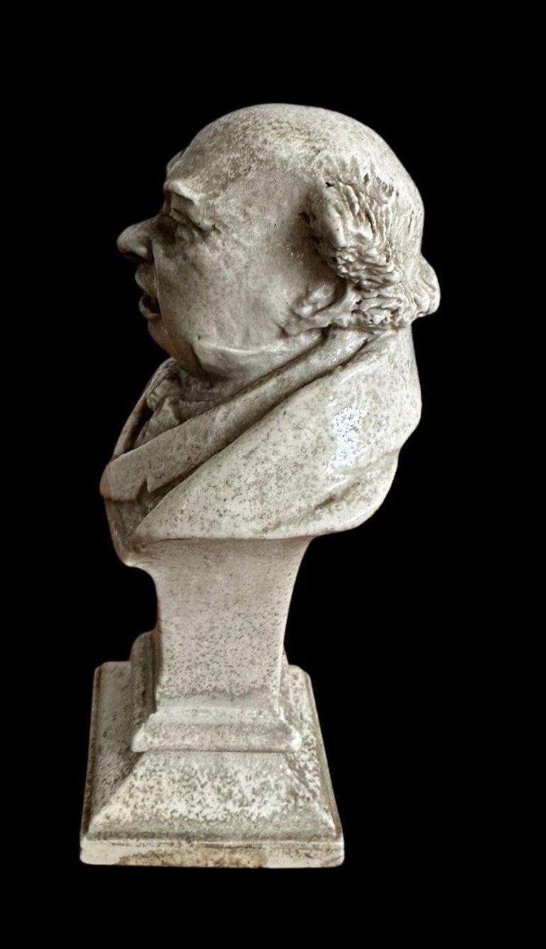 5
R W Martin for the Martin Brothers.
Bust of Samuel Pickwick on a Plinth
Marked to the front “Samuel Pickwick GCMPC” (General Chairman - Member Pickwick Club)
11cm high
Firing crack to the base of the plinth
Dated 1906