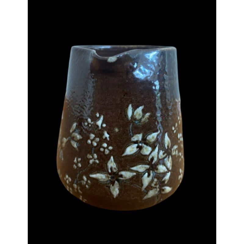 Martin Brother’s Jug decorated with blossom

Slight glaze frit to lip

Dimensions: 5cm high, 6cm wide

Circa 1900

Complimentary Insured Postage
14 Day Money Back Guarantee
BADA Member – Buy the Best from the Best.