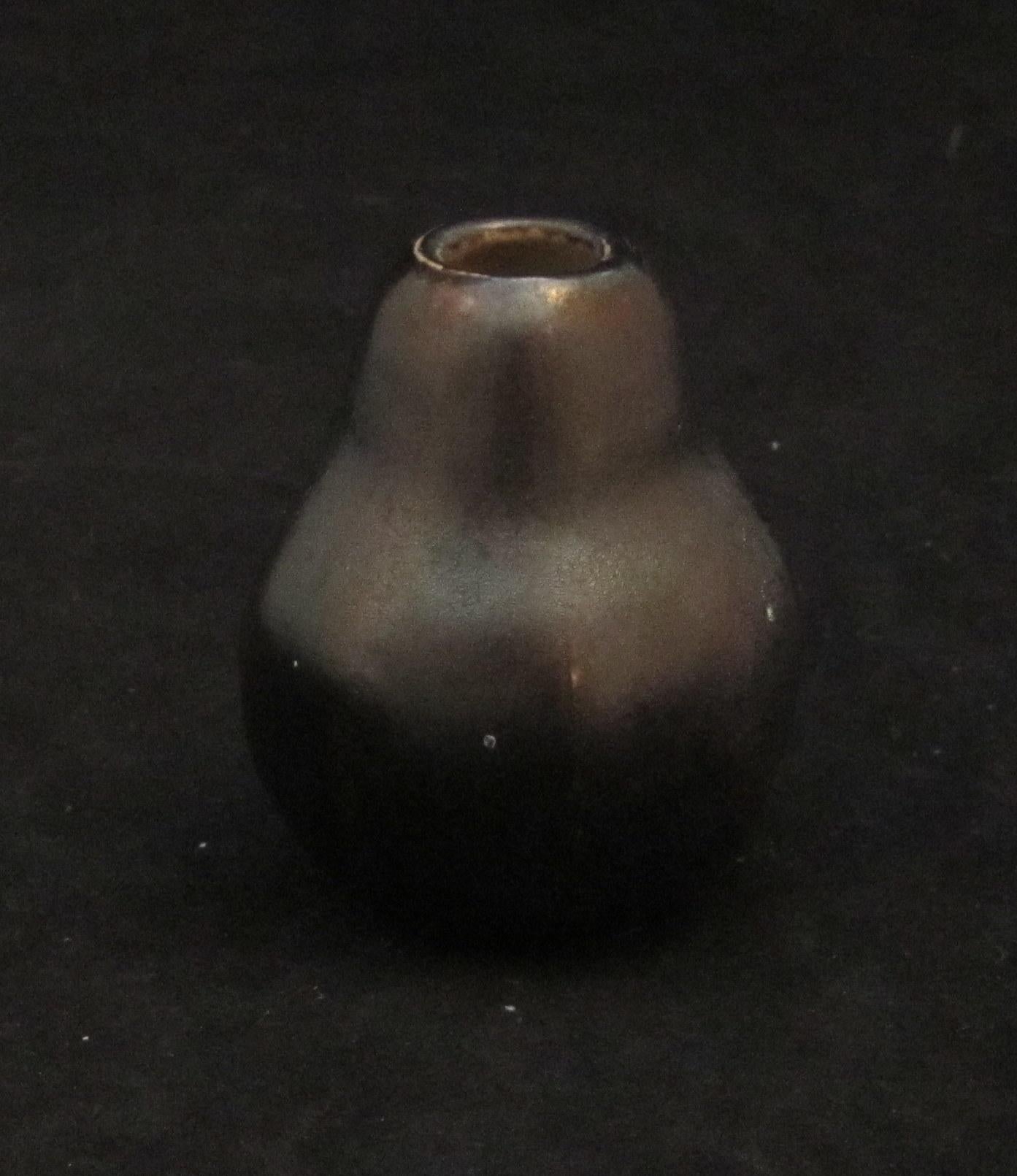 Edwin Martin for the Martin Brothers.
Martin Brothers miniature double gourd vase in a gunmetal coloured glaze. 

Dated 1904.