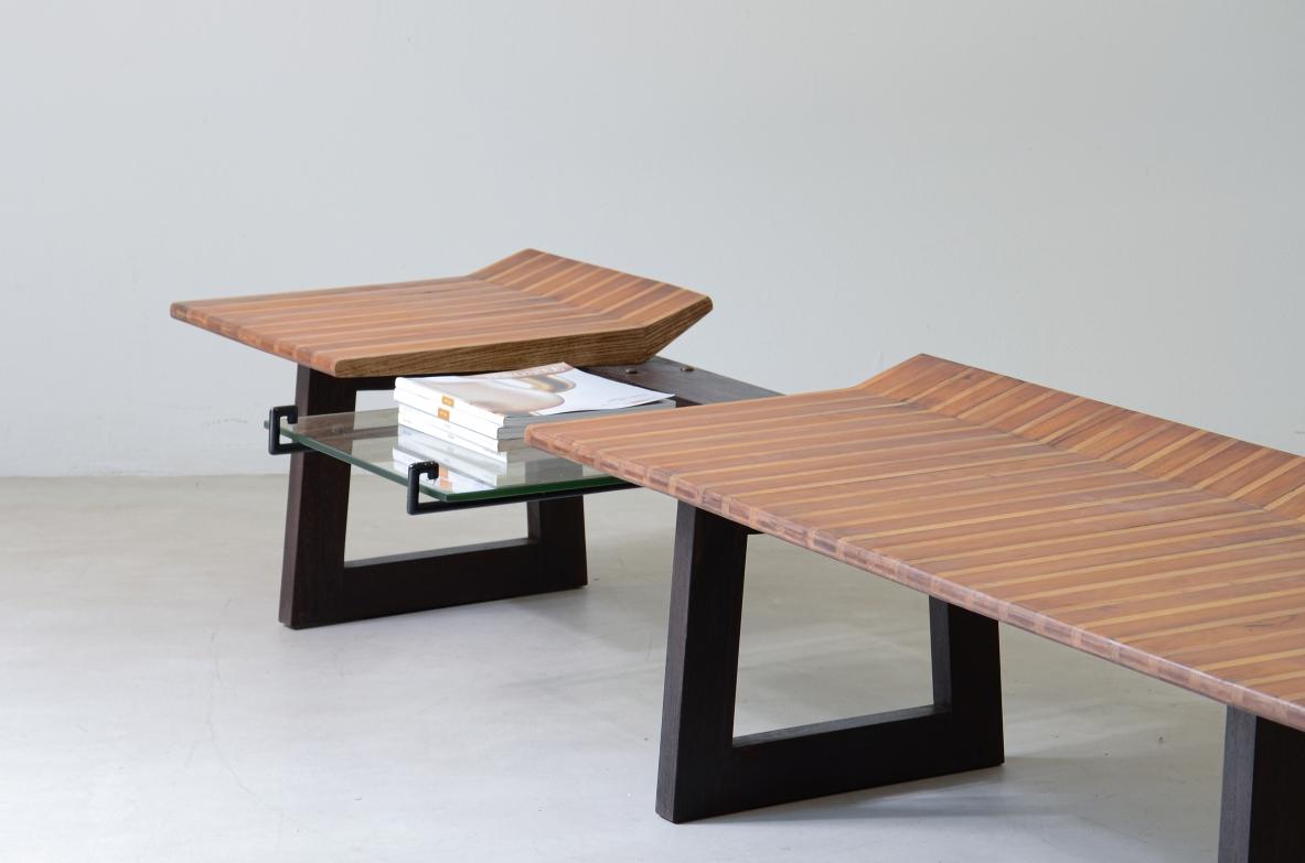 COS-2639
Martin Eisler (1913-1977)

Große Bank mit Sitzfläche aus polychromem Holz und Platte aus geschliffenem Glas mit Metallstruktur, entworfen für eine Privatwohnung. Drei Pfosten aus gebeiztem Kastanienholz.

Herstellung in den 1950er Jahren.