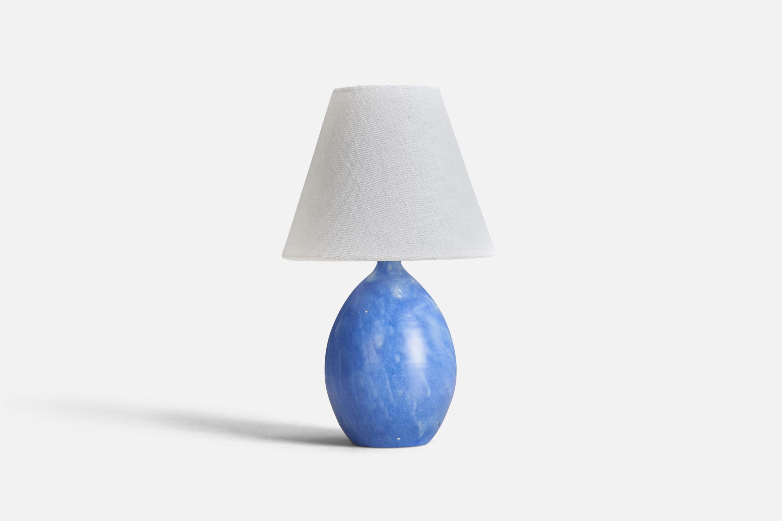 A stoneware table lamp designed by Martin Flodén and produced in Arvika, Sweden, 1970s.

Dimensions of lamp (inches) : 9.5 x 5 x 5 (Height x Width x Depth)
Dimensions of lampshade (inches) : 4 x 8 x 6.5 (Top Diameter x Bottom Diameter x