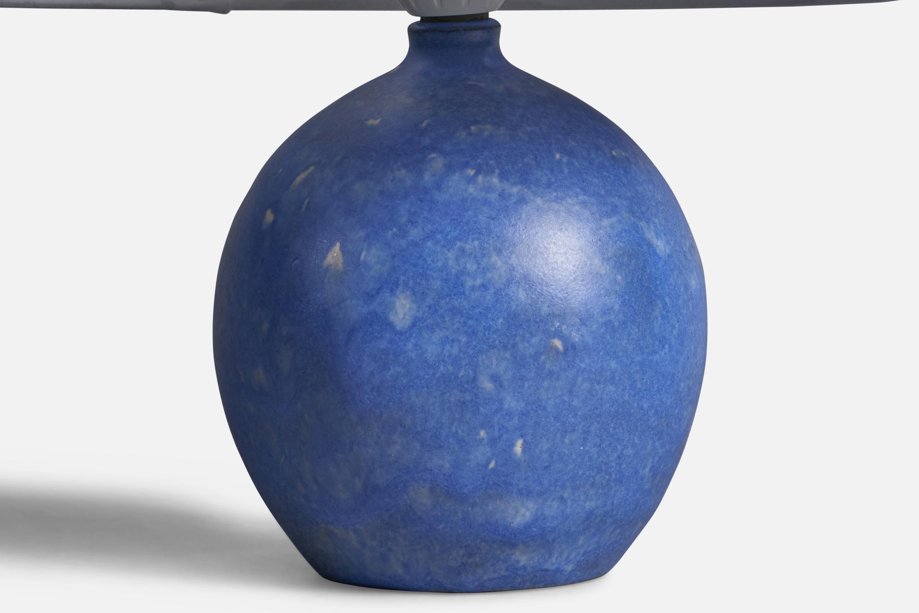 A blue-glazed stoneware table lamp designed and produced by Martin Flodén, Arvika, Sweden, 1960s.

Dimensions of Lamp (inches): 8.15