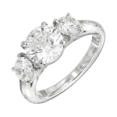 Retro Martin Flyer GIA 1.52 Carat Diamond Platinum Three-Stone Engagement Ring