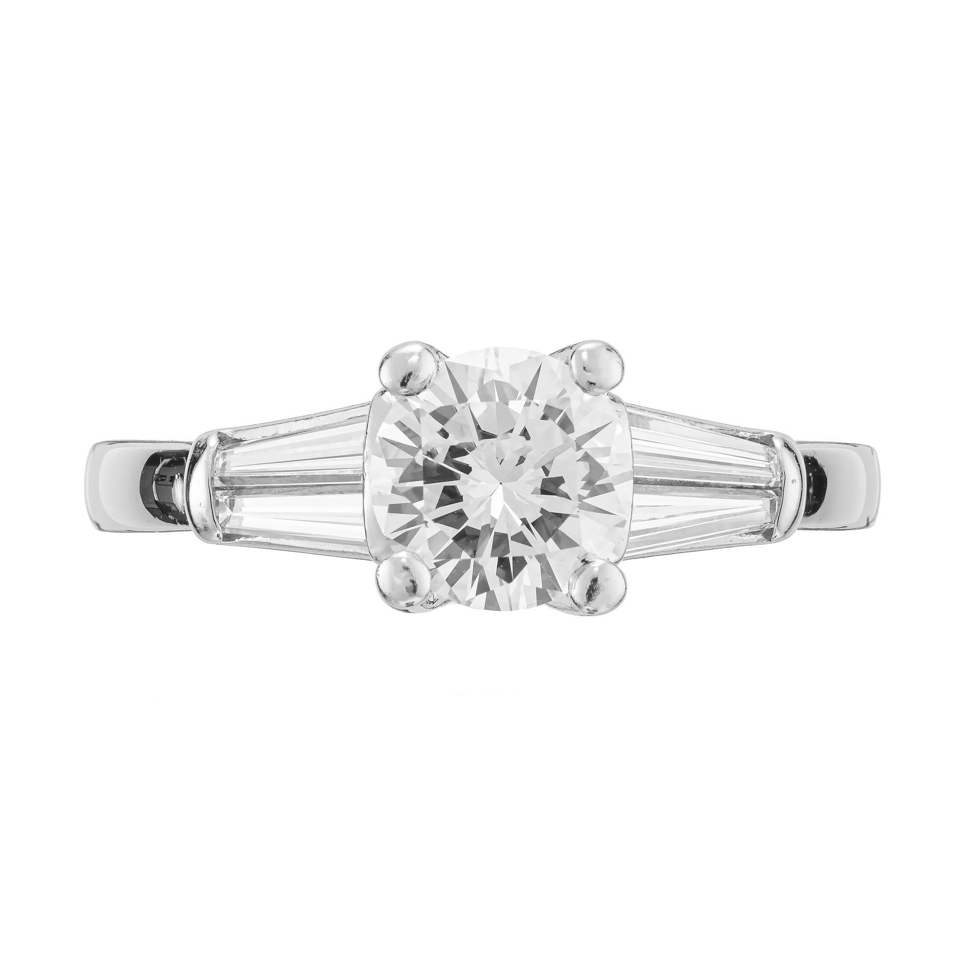 Martin Flyer 1940's diamond engagement ring. GIA certified round brilliant cut center stone with 4 tapered baguette side diamonds in a platinum setting. Exceptional brilliance. The cutting is to the standards of the 1940's transitional with more