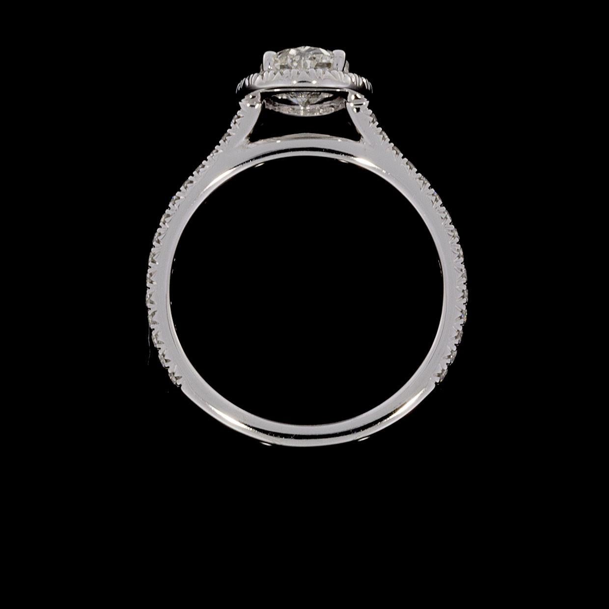 Martin Flyer White Gold 1.31 Carat GIA Certified Oval Diamond Halo Ring In New Condition In Columbia, MO