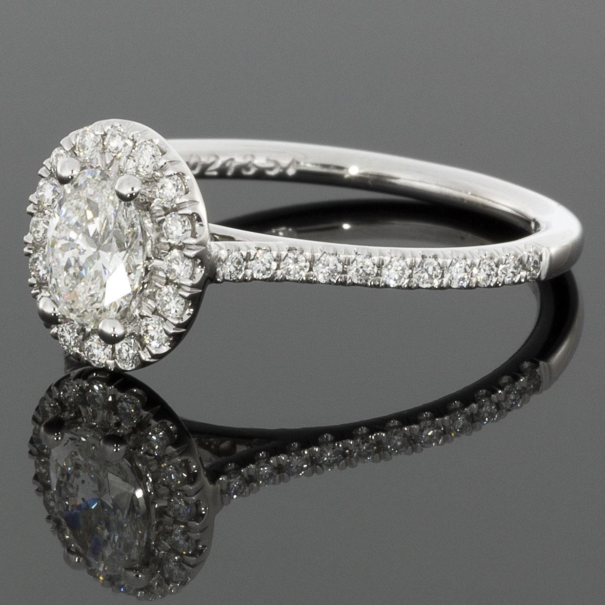 Item Details:
Brand - Martin Flyer
Metal - White Gold
Complete Ring Total Carat Weight (TCW) - 0.80 ct
Certification/Grading - GIA
Style - Halo Engagement Ring
Ring Size - 6.50
Sizable - Yes
Width - 1.60 mm
Metal Purity - 14k

Stone 1