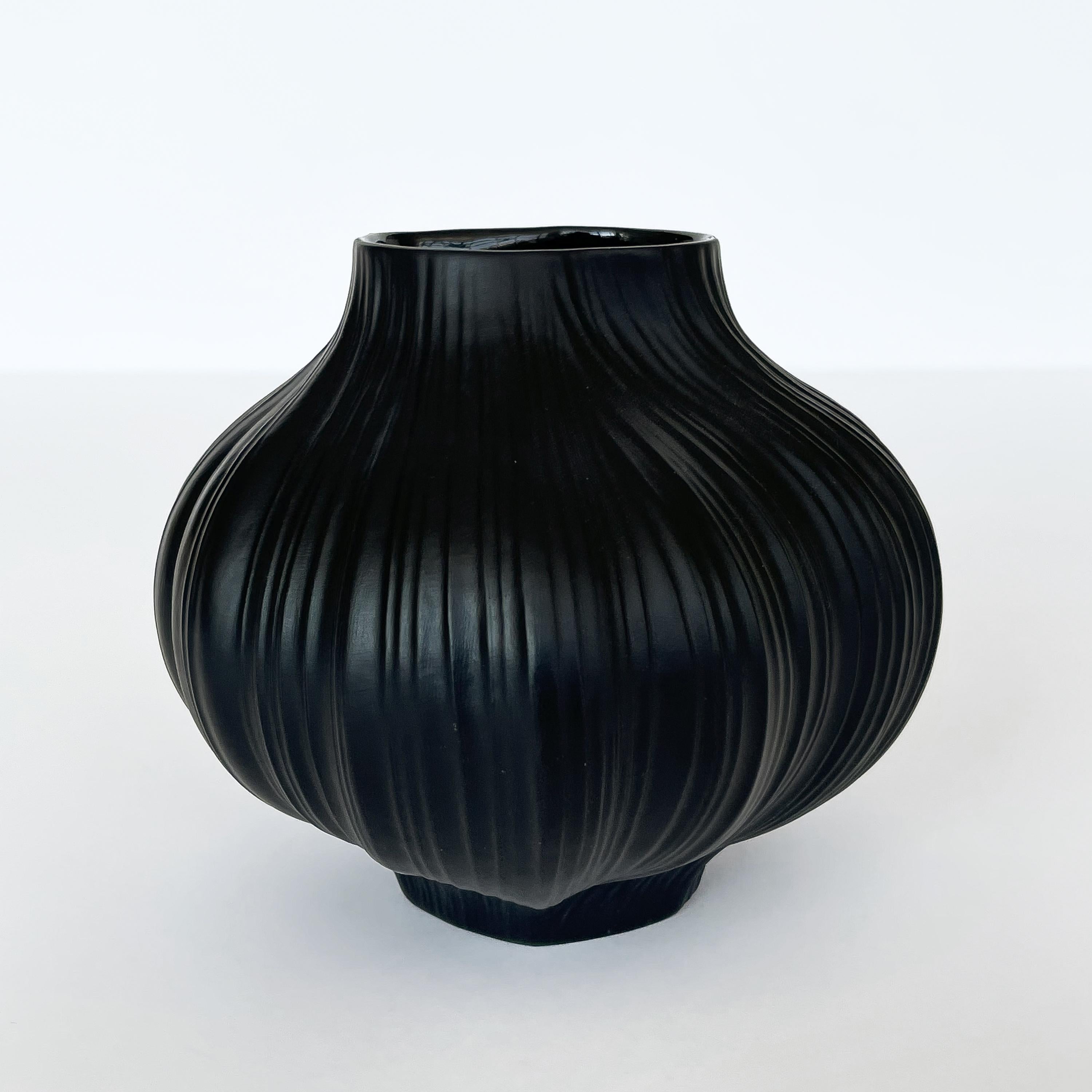Unglazed matte black porcelain Plissée vase designed Martin Freyer for Rosenthal Studio Line, Germany 1960s. Black unglazed porcelain with pleated / draped form. Signed underneath: Rosenthal Studio Line, Martin Freyer, Germany. The base and interior