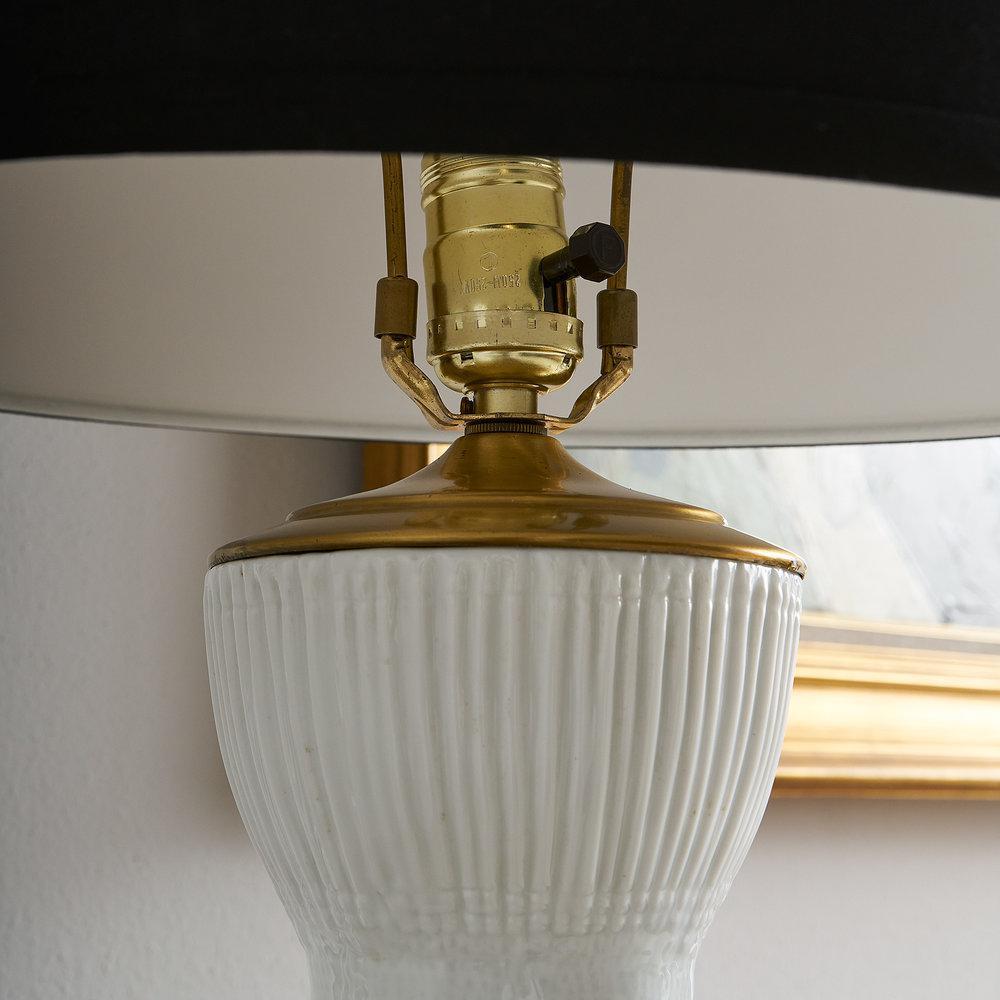 An elegant porcelain table lamp designed by German painter and designer Martin Freyer for Rosenthal in 1969. This features gorgeous relief work. Lampshade not included, please inquire for availability of options.

Dimensions: 27.5” Total height x