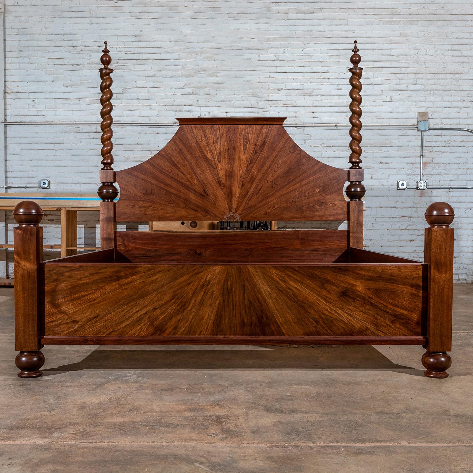 This one of a kind bespoke contemporary take on a Jacobean classic barley twist king size four-poster bed frame by master craftsman - artisan Martin Goebel. Made of Michigan black walnut that was salvaged from storm-damaged trees, is designed with a