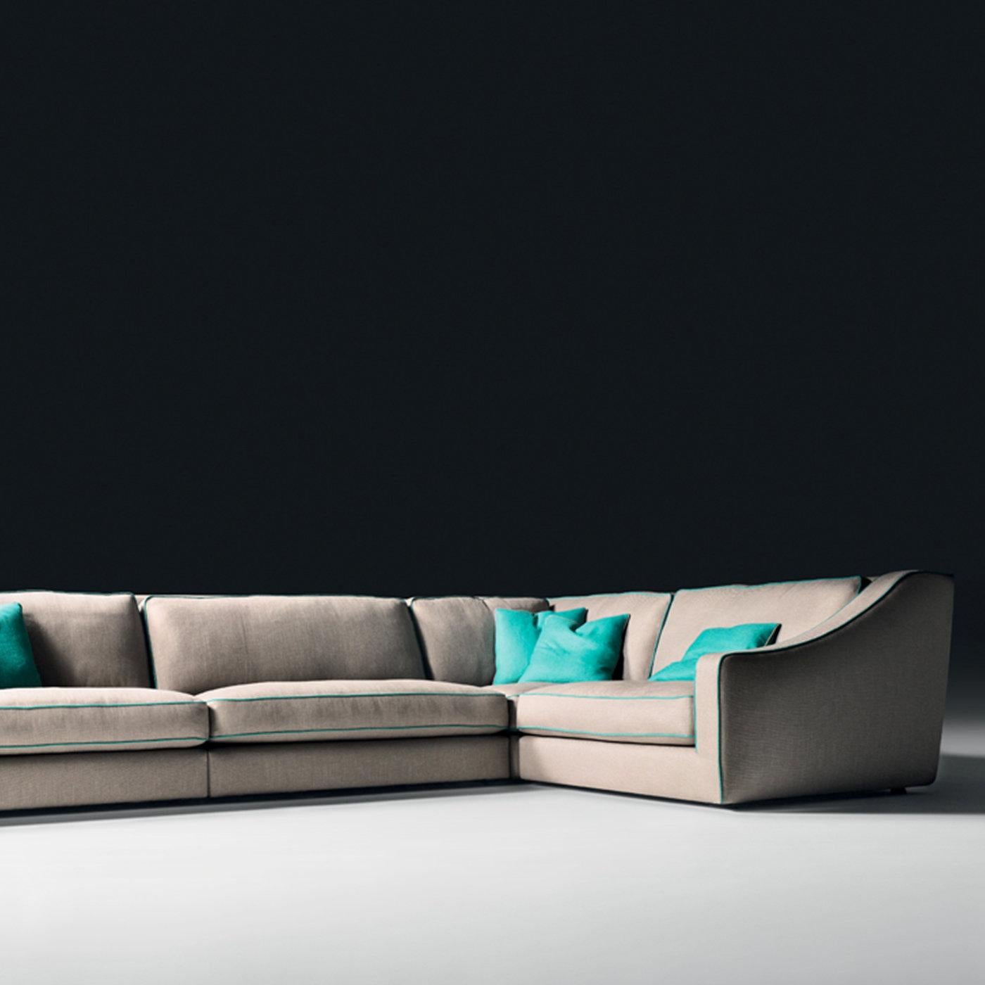 Boasting a clean and minimal design defined by exquisite lines outlining the soft edges of this simple and charming silhouette, this sofa comprises a poplar and fir structure covered with thermo-bonded fiber mixed with flexible jersey fabric that is