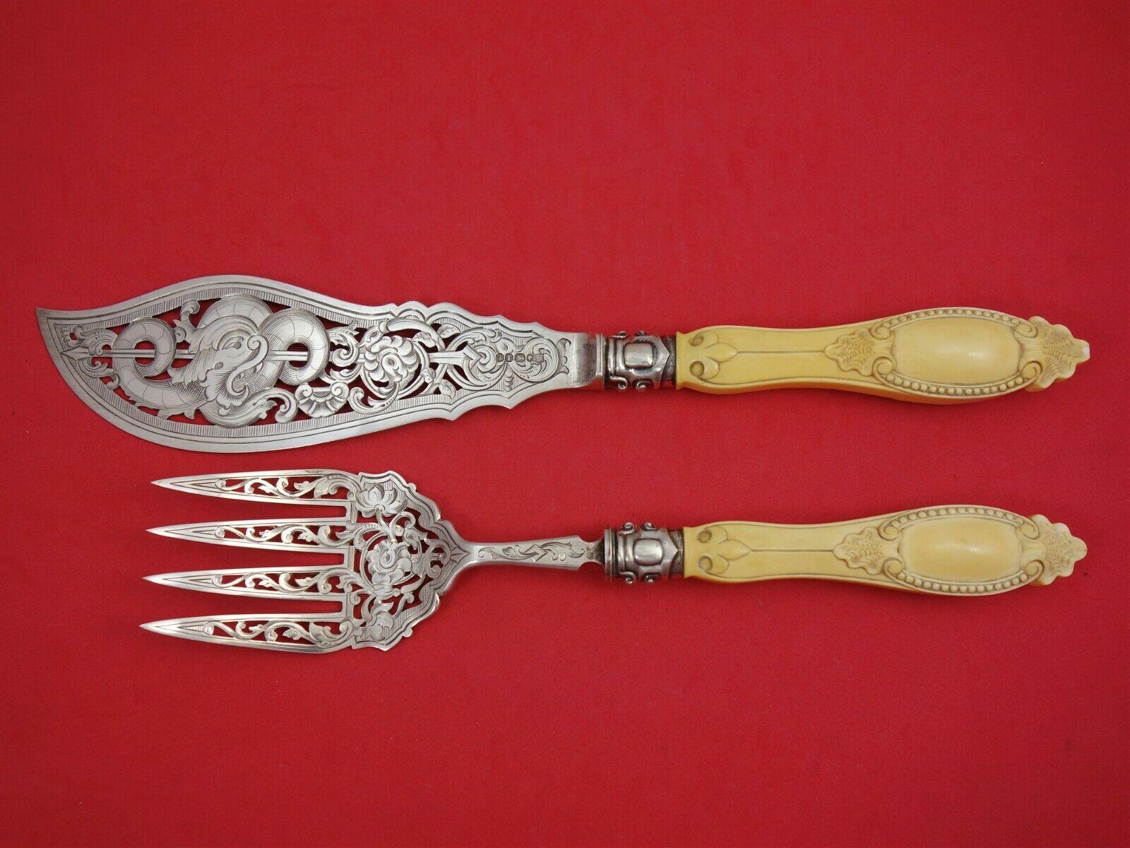 Martin Hall and Co


Incredibly detailed English sterling fish serving set with carved bone handles. The large server is pierced with a sea serpent on trident. Made by Martin, Hall & Co of Sheffield, England with date mark for 1861. Server