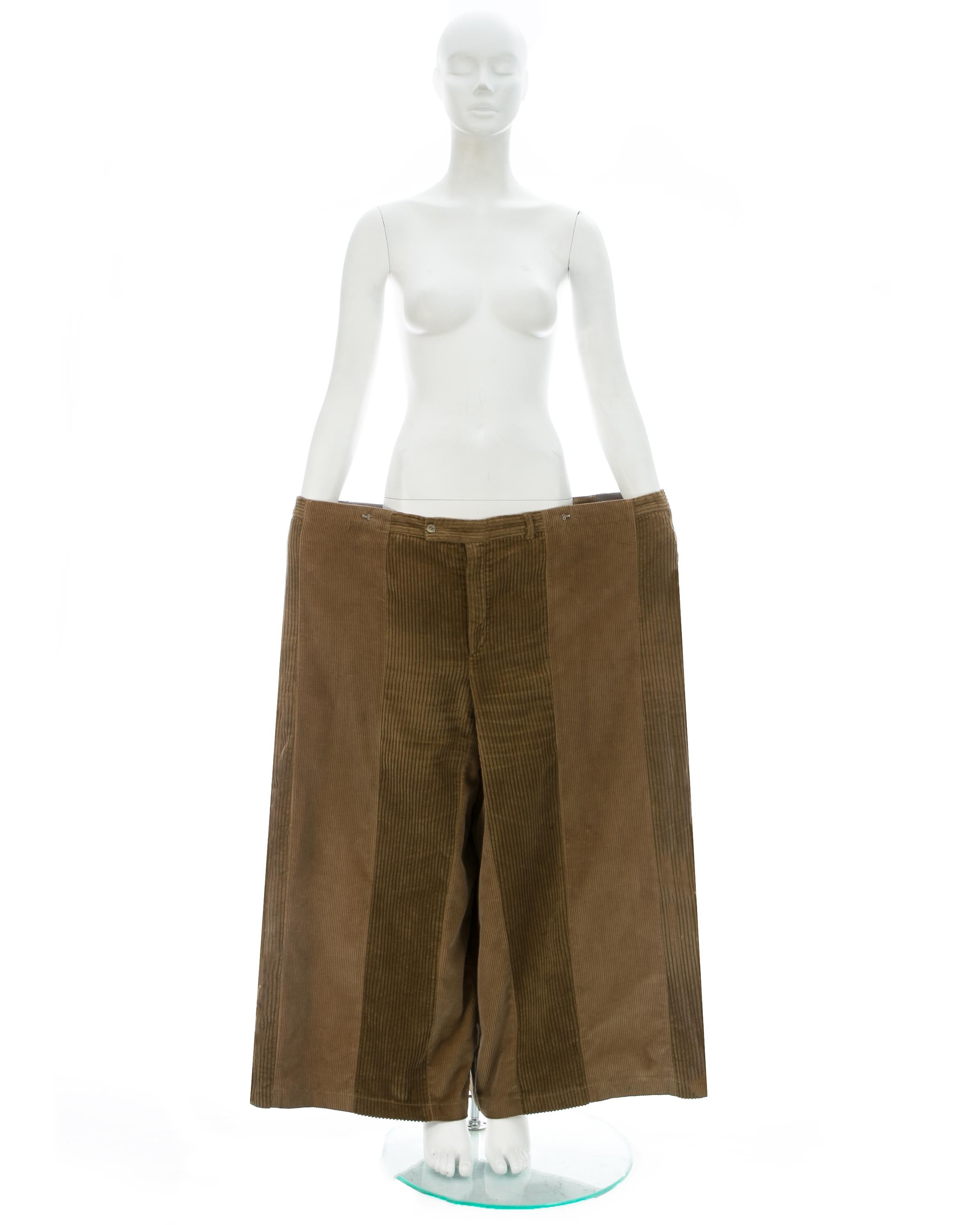 Margiela; Oversized pants reconstructed with 2 pairs of vintage corduroy pants. Fastened together with 2 metal hooks and 1 button closure inside. 

Fall-Winter 2000