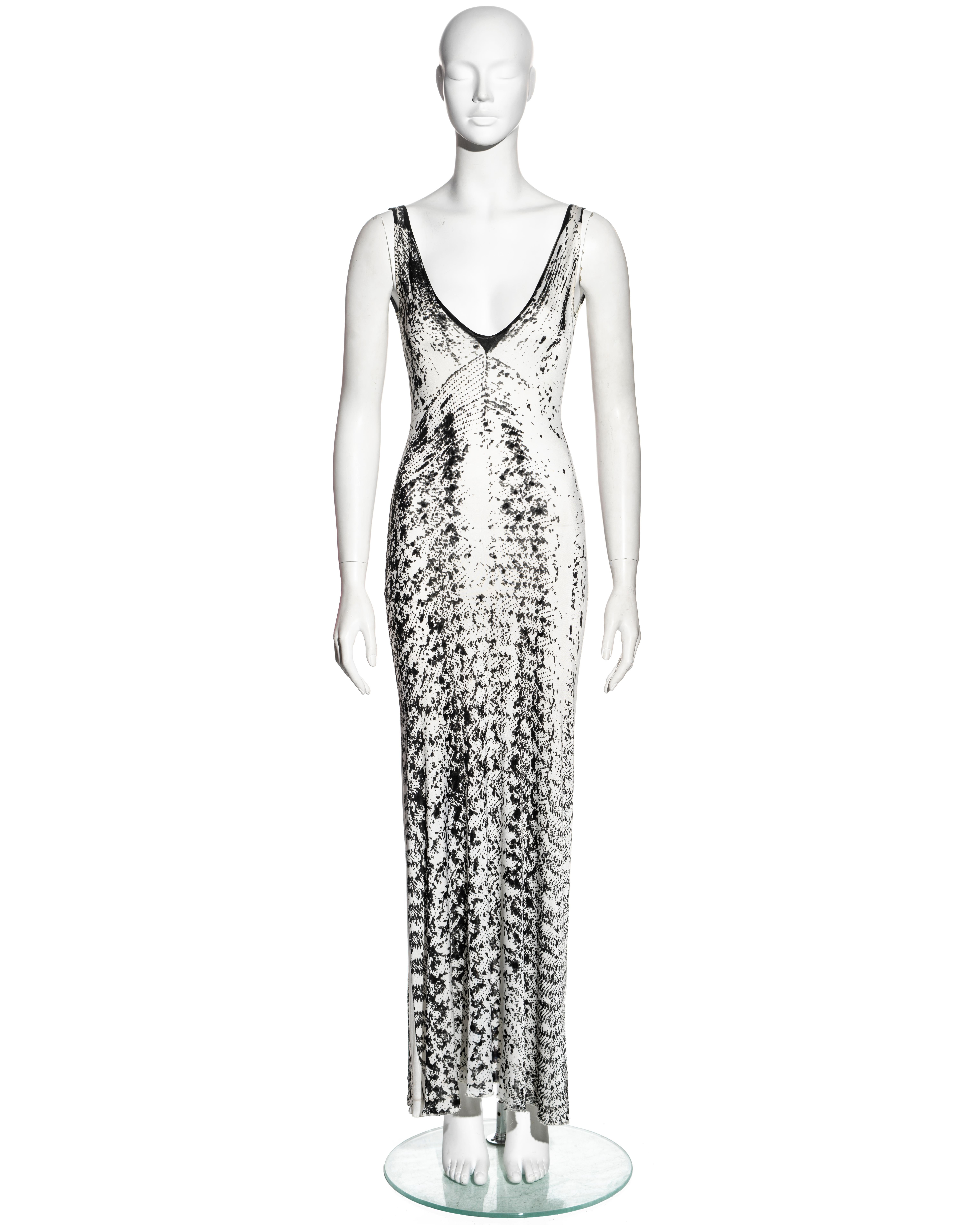 ▪ Martin Margiela maxi dress
▪ Constructed from rayon jersey 
▪ Print features a black and white trompe l’oeil scanned image of a sequin dress; a reference from the ss 1996 collection
▪ Deep v-neck 
▪ Size Small 
▪ Spring-Summer 1999

All