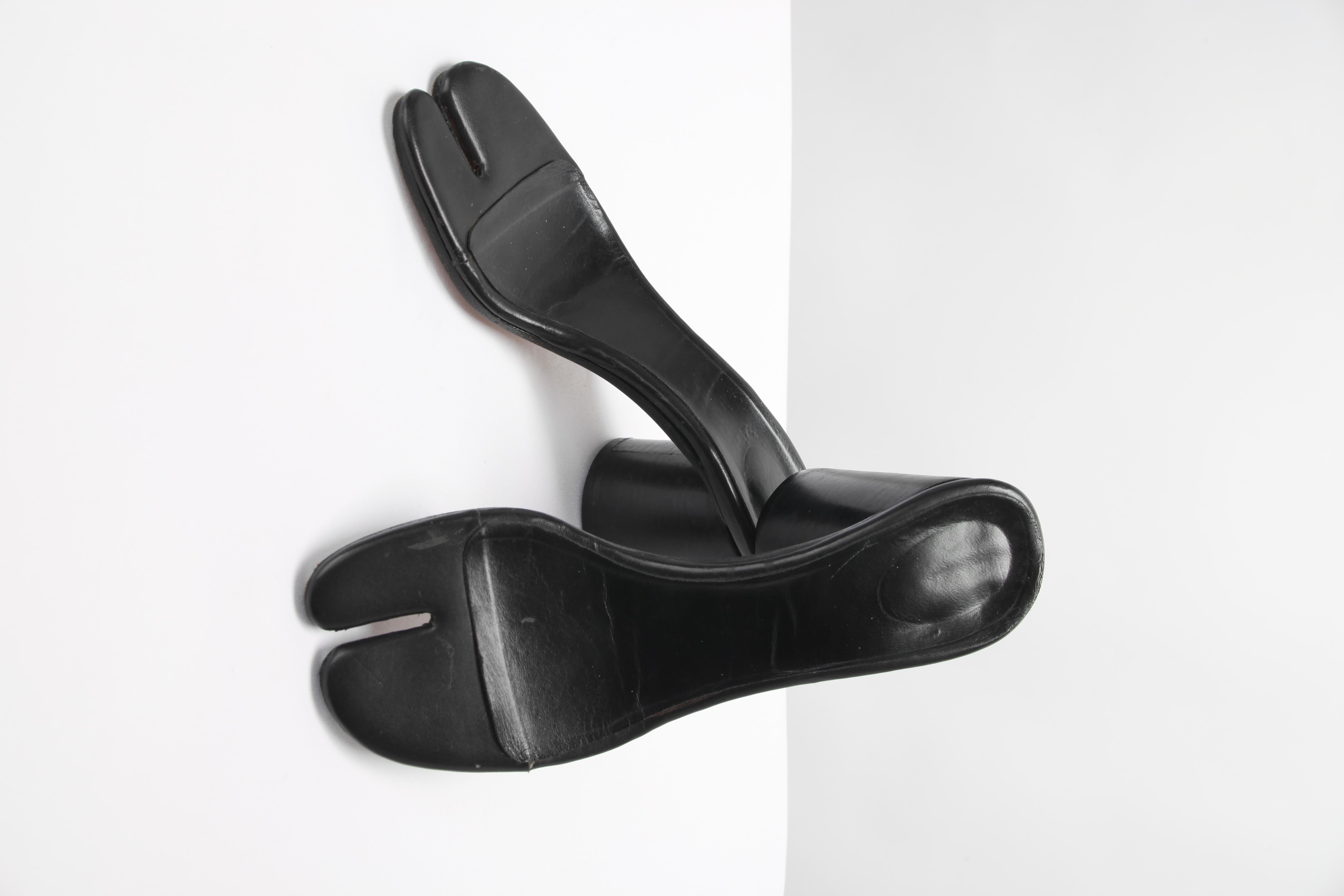 Martin Margiela black leather 'Les Topless' Tabi sandals, SS 1996,
Designed to be worn with clear tape.
Marked EU Size 40.  Fits US Size Size 10.
