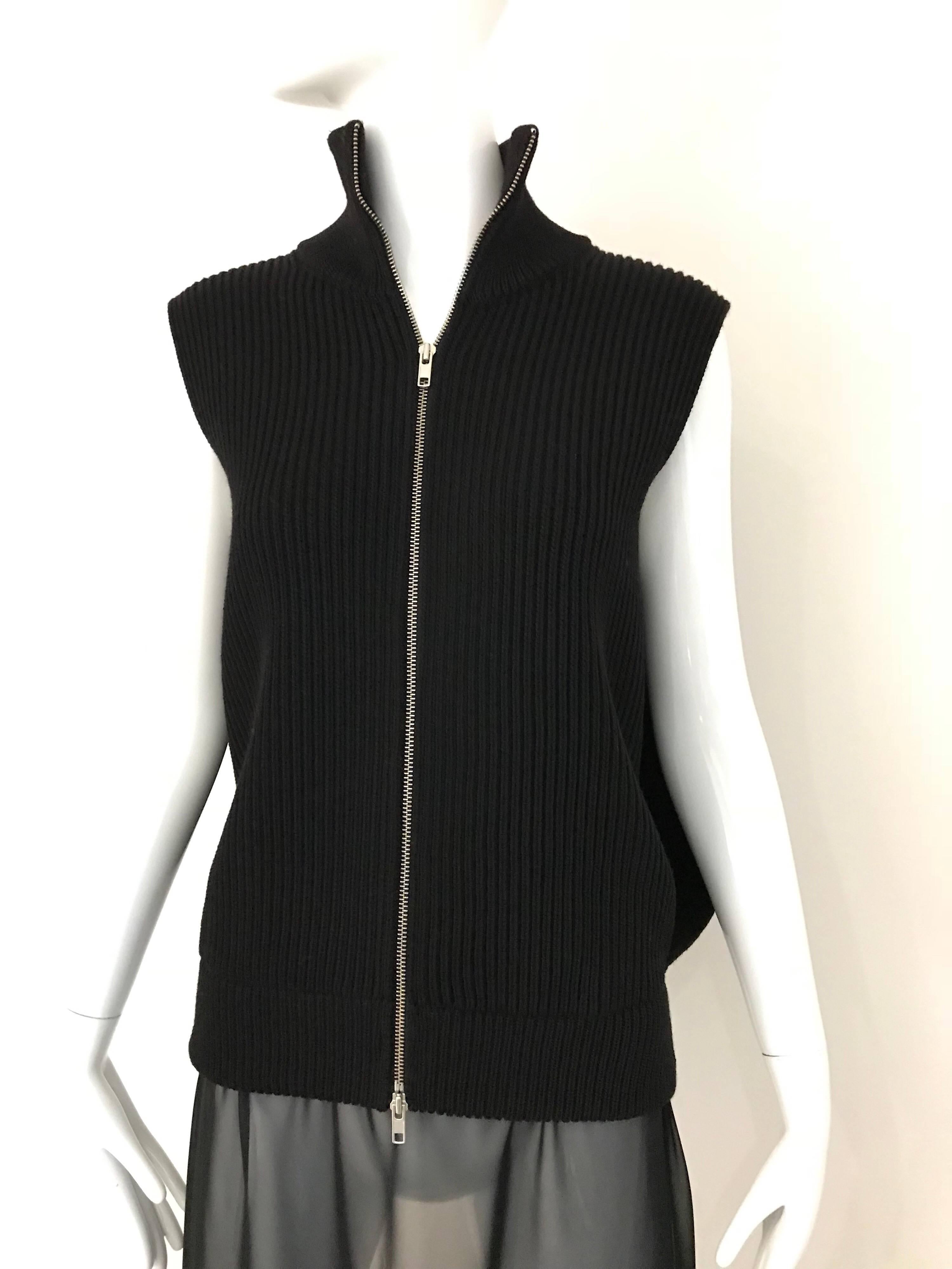 Martin Margiela Sleeveless black wool maxi cardigan top with sheer silk.
Fit size 4/6
