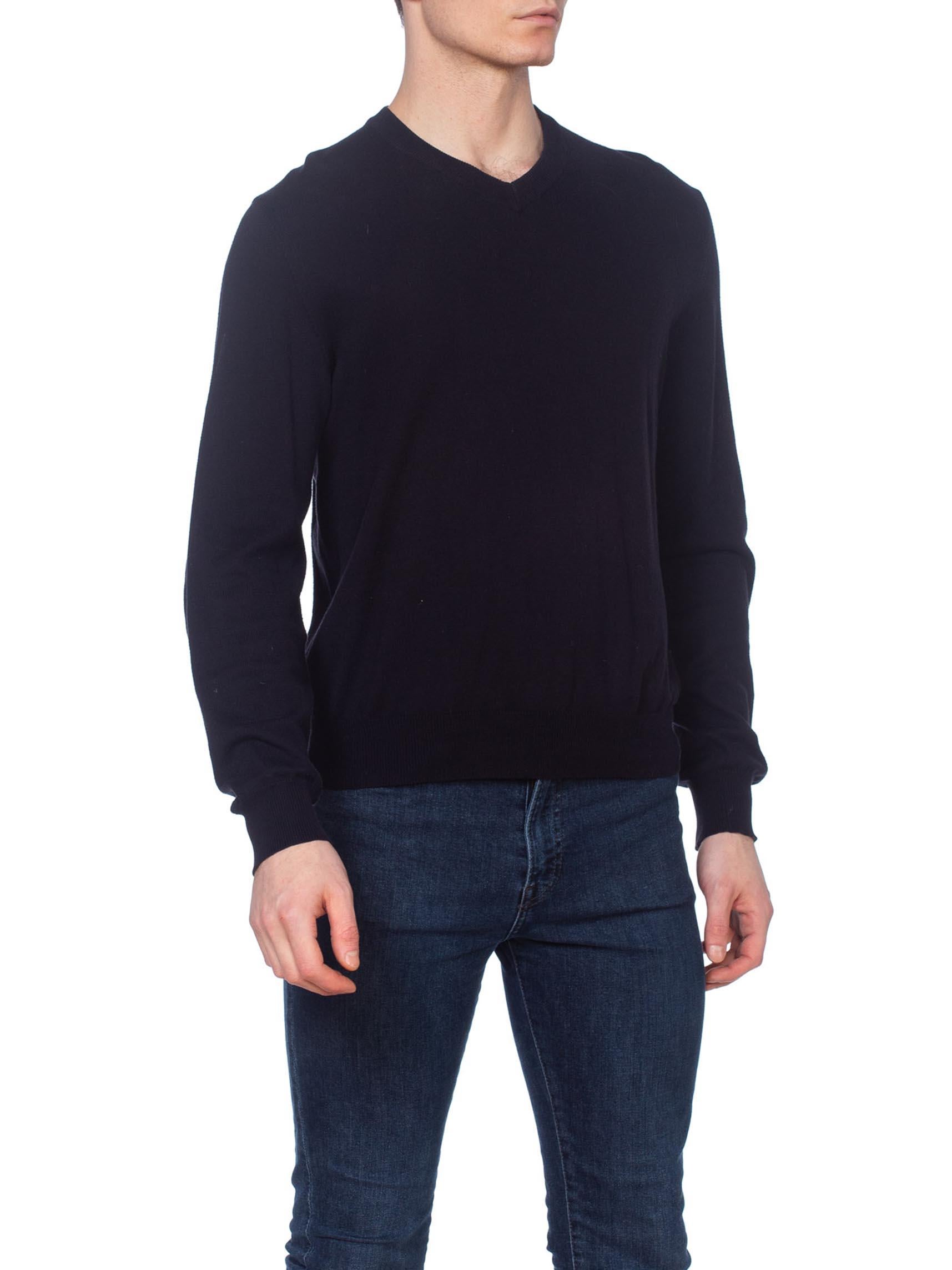 black sweater with elbow patches