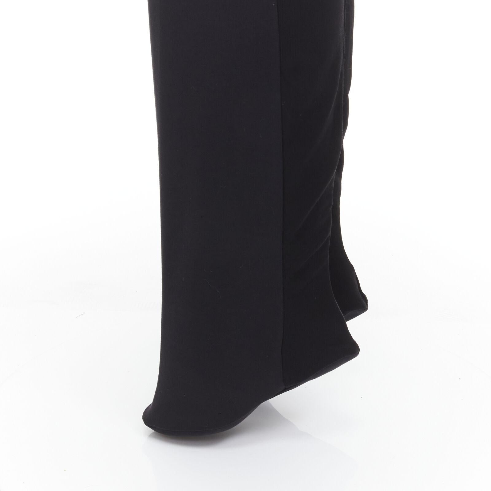 MARTIN MARGIELA Vintage Runway black minimal straight leg stocking pants IT42 M
Reference: EACN/A00070
Brand: Martin Margiela
Model: 29KA035
Collection: Runway
Material: Viscose, Blend
Color: Black
Pattern: Solid
Extra Details: Damaged zipper,