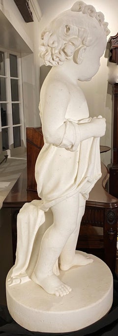 Sculpture of a Young Boy with Robe