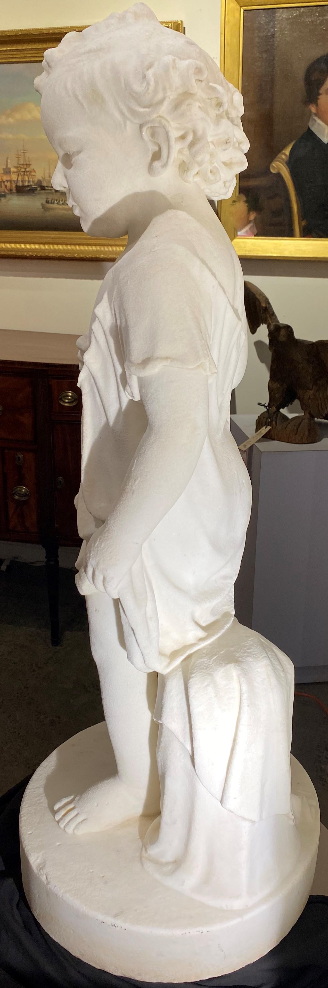 A fine classical form marble sculpture of a young boy with robe by Irish / American artist Martin Milmore (1844-1883). Milmore was born in Sligo, Ireland and was brought to Boston, Massachusetts in 1851, where his training began with his brother,