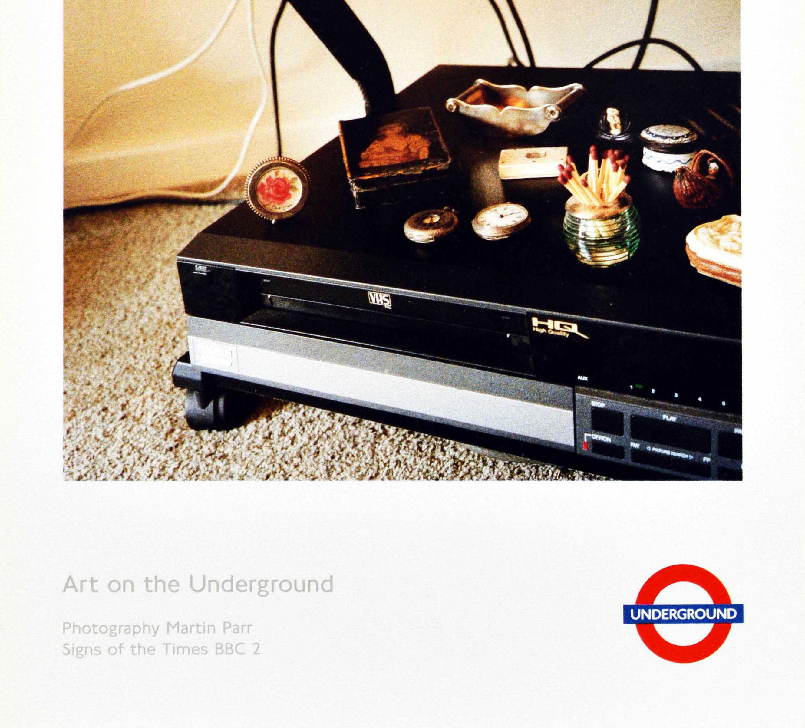 Original vintage London Underground poster featuring a photograph of a Sony television and ornaments on a VHS video recorder below it with the text reading: I think we are very lucky to have informed taste - with my position as a fine arts valuer.