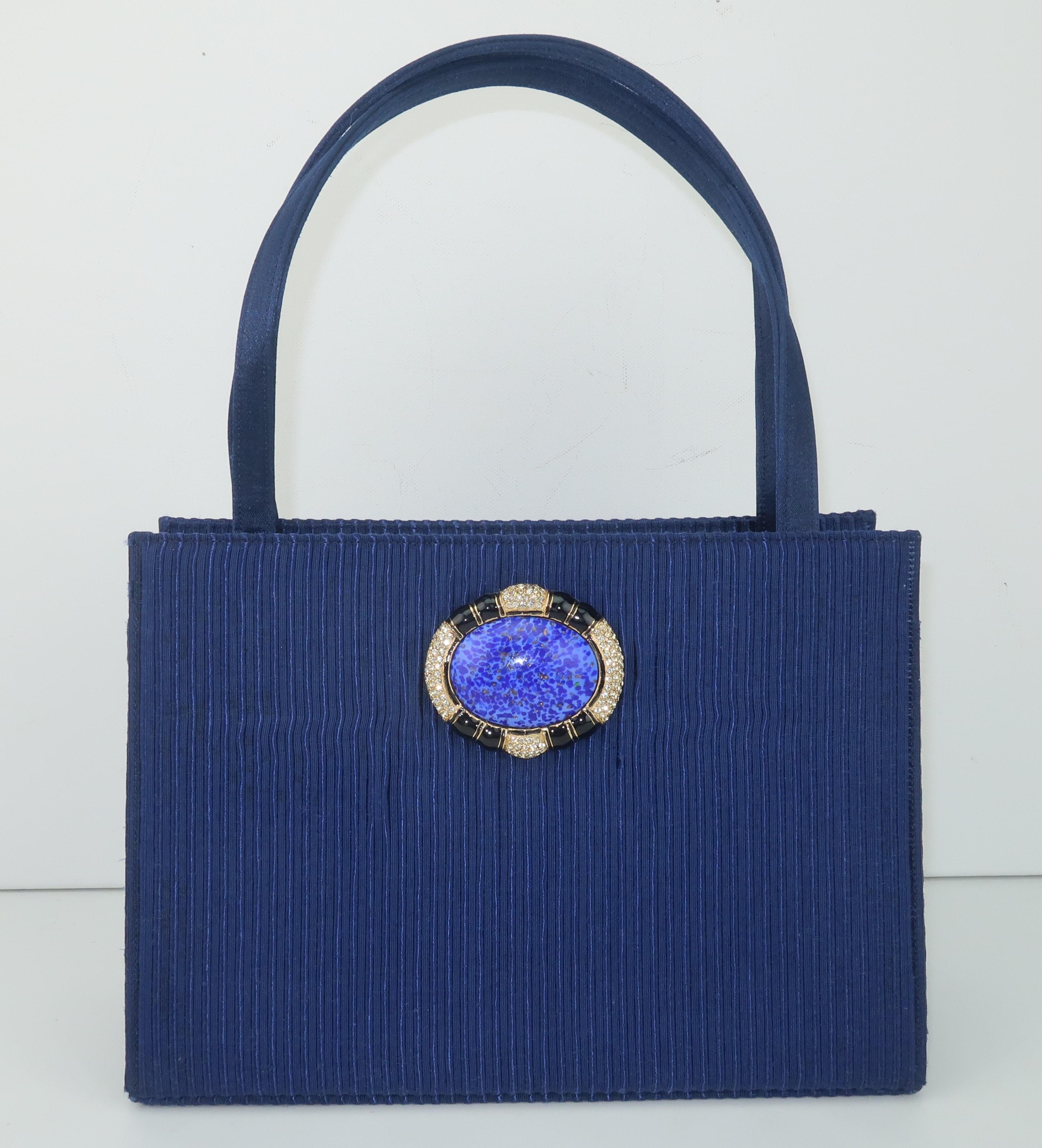It's a Schaak attack!  A fabulous Martin Van Schaak dark royal blue fabric top handle handbag with a glass medallion decoration is on the prowl just waiting to add a dash of vintage glamour to your wardrobe.  Mr. Van Schaak's handbag designs are