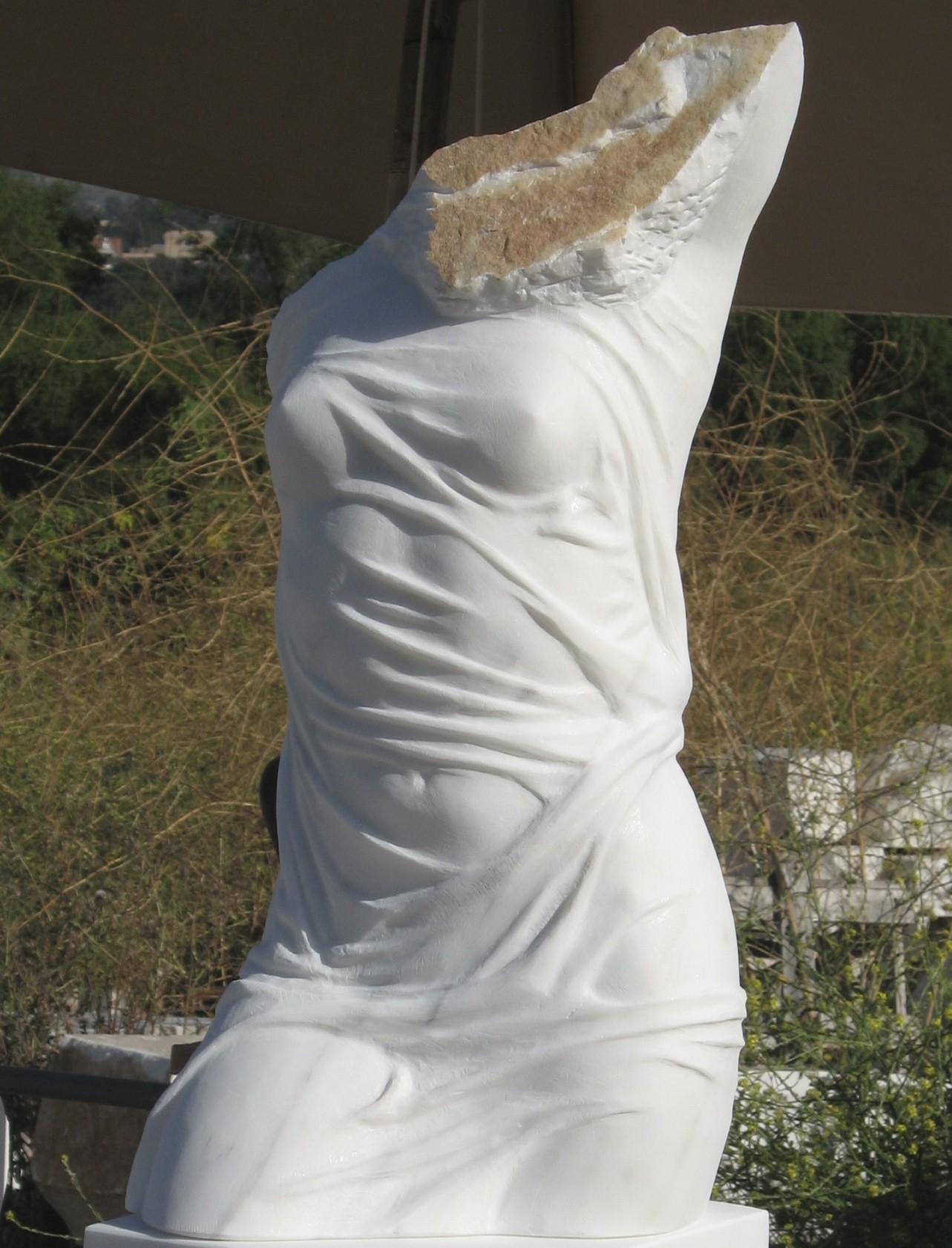 Martin Varo Figurative Sculpture - Rusted Wing: Hand carved Carrara Marble Sculpture, Post-Modern