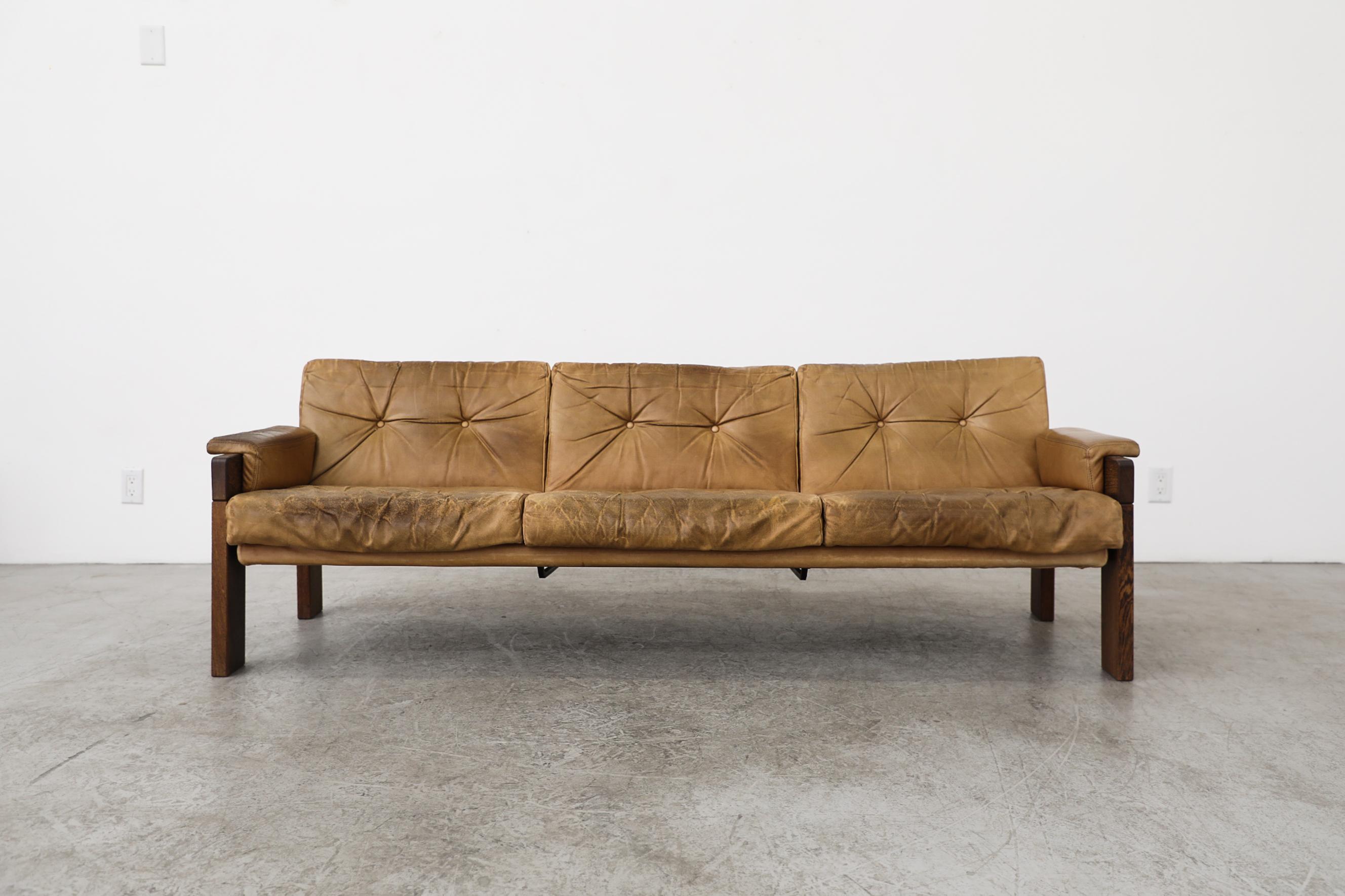 Mid century 1970's wenge and caramel leather sofa designed by Martin Visser for renowned Dutch furniture manufacturer 't Spectrum. Honest use of materials, clear construction and lack of decoration are hallmarks of Visser's design and are on clear